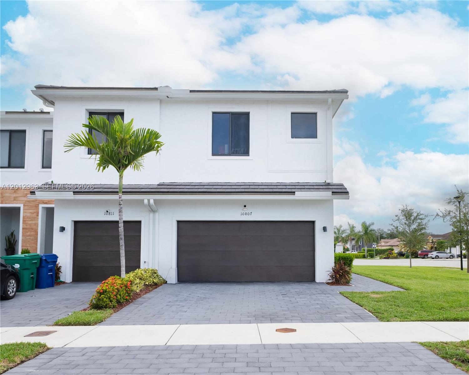Beautiful 3-bedroom, 2.5-bath corner townhouse built in 2022, located in the desirable Keys at the Landings community in Homestead. Features 1,705 sq ft of living space with an open-concept layout, modern kitchen with stainless steel appliances, and an oversized 1-car garage with enough space to fit 2 vehicles, plus driveway parking for 2 additional cars. Plenty of guest parking available nearby. Corner unit offers extra privacy and abundant natural light. Tile floors downstairs and carpet upstairs. HOA includes access to beautiful community amenities, including a resort-style pool and clubhouse with seating areas, restrooms, and space for gatherings and events. Conveniently located near schools, shopping, dining, and major highways. Great opportunity for first-time buyers or investors!