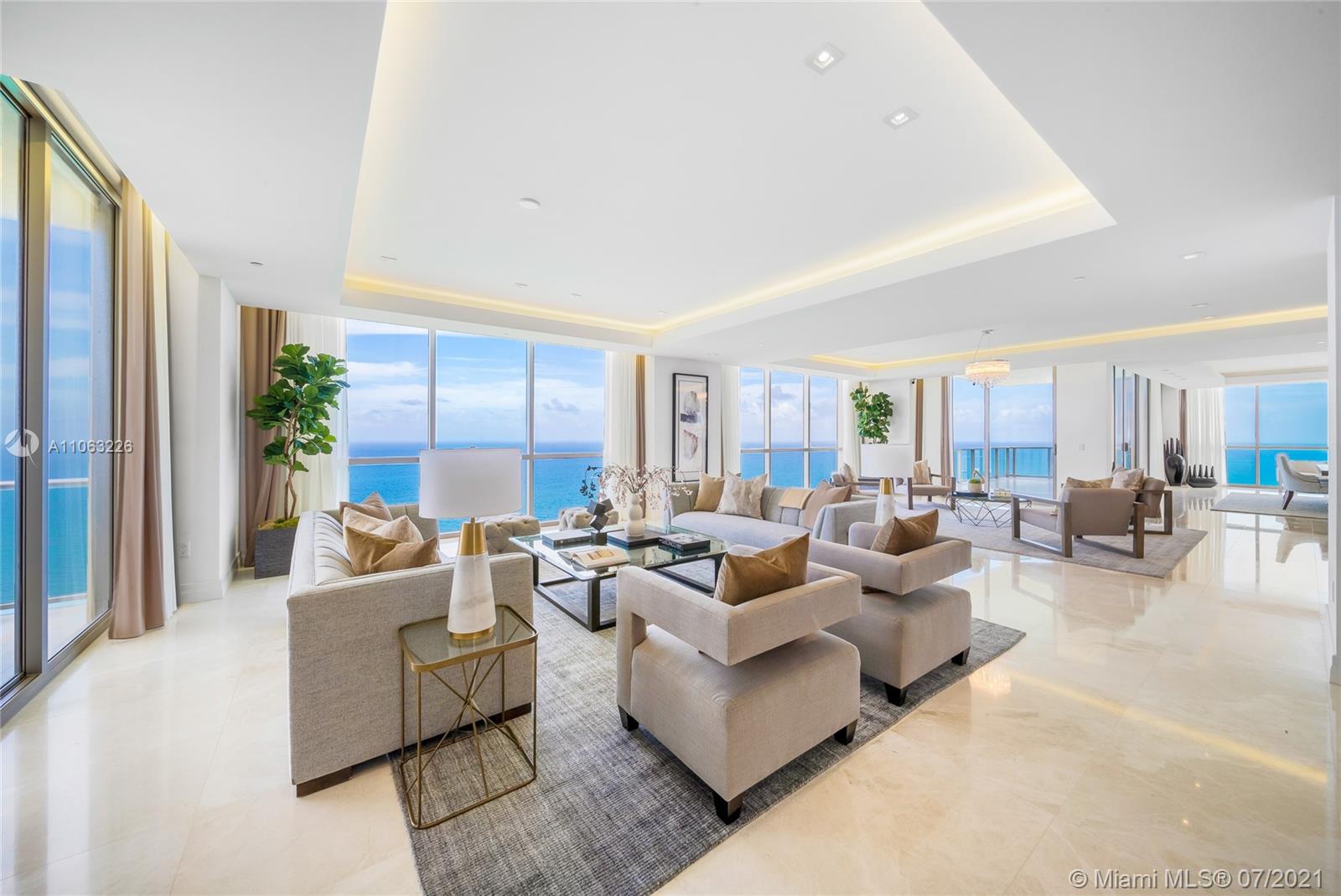 Live the 5-star luxury resort lifestyle from the entire full floor Tower Suite at the very exclusive and private Mansions at Aqualina in Sunny Isles, Florida. This full-floor includes 4 bedrooms, 5 and a half bathrooms for a total of 9,218 sqft. Unit features stunning marble and wood floors, floor to ceiling high-impact windows, full bar, gourmet kitchen with top appliances, and outdoor summer kitchen with a barbecue, This Oceanfront mansion in the Sky includes 4 terraces, a private pool/jacuzzi, and 360-degree views of the Ocean, Intracoastal and Miami’s skyline. The Tower Suite includes a private covered garage for 2 cars. The tower offers Doorman, 24-hour security, movie theater, oceanfront exercise room, wine and cigar lounge, beach service, game room, soccer field, room service, more.