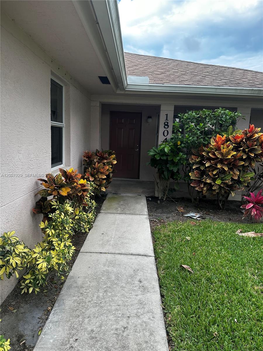 This is a well-maintained 2-bedroom, 2-bath house with 1286 square feet, built in 2007 and updated for modern, low-maintenance living.  It features an open layout with tray ceilings, tile flooring.  The primary suite includes a large bathroom with dual sinks, soaking tub, and separate shower.  Notable highlights include a new 2024 roof, peaceful setting, and convenient location near amenities and beaches.  Overall, it's a comfortable, practical home-ideal for downsizes, first-time buyers, or anyone seeking easy Florida living with a bit of privacy.