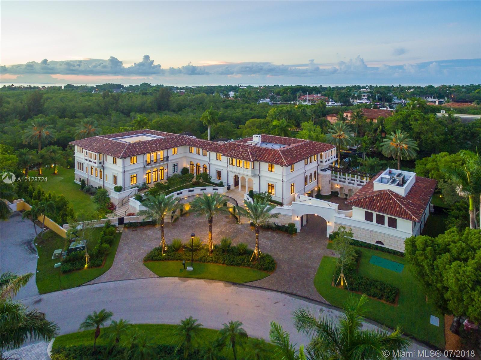 Completed in May 2016 "Casa Costanera" is an impressive modern Mediterranean estate. Located in exclusive Cocoplum, this custom designed elegant home sits on a corner lot with 1.3 acres for maximum privacy and over 480ft of water frontage. Offering 20,546 sf of living space, this home features exceptional craftsmanship with designer interior finishes, commercial elevator, 3 kitchens, separate staff/guest quarters +more. Situated on Coral Gables waterway with direct access to Biscayne bay.