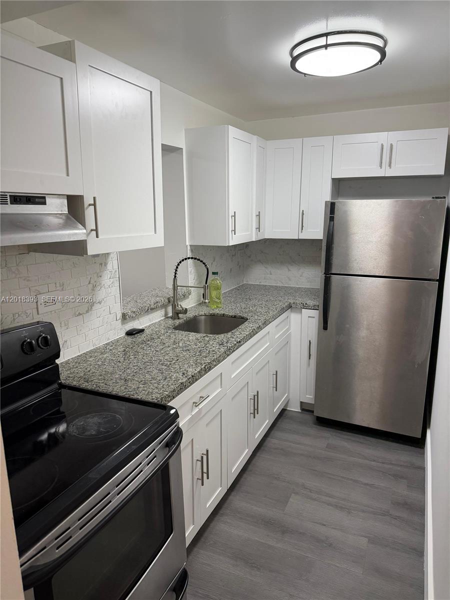Beautifully renovated condo with TWO ASSIGNED PARKING SPACES. Will not last. Great location.