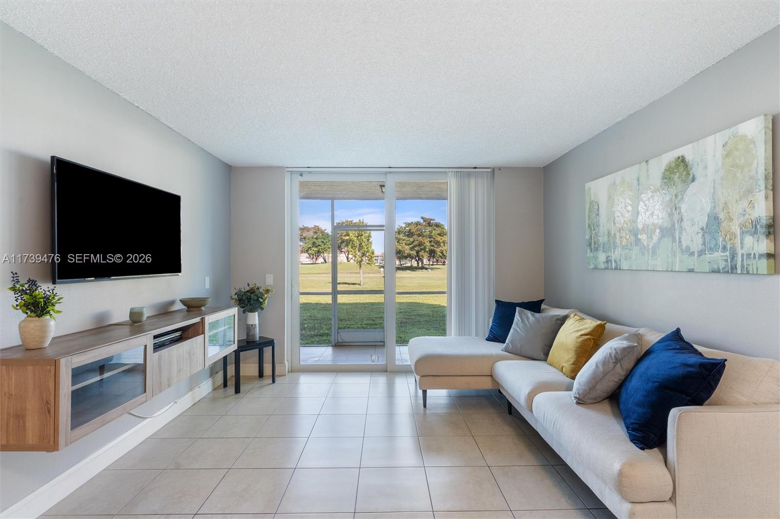 Great 1 bedroom, 1 bathroom, 1st floor condo in the Sunrise Lakes 55+ community.  Kitchen has modern countertops & cabinetry. Renovated bathroom. Impact windows & patio doors. New 2024 A/C compressor. Tile floors throughout. Screened-in patio with a beautiful garden view. 1 assigned parking space. Sunrise Lakes offers an active, vibrant lifestyle w/ 24/7 security & many amenities, including golf, indoor & outdoor pools, fitness center, BBQ/picnic area, pickleball, billiards,tennis, walking path, theater & more. Community shuttle bus takes residents to nearby shopping centers & essential stores. Sunrise Lakes is ideally located near restaurants, medical facilities & the Fort Lauderdale airport.
