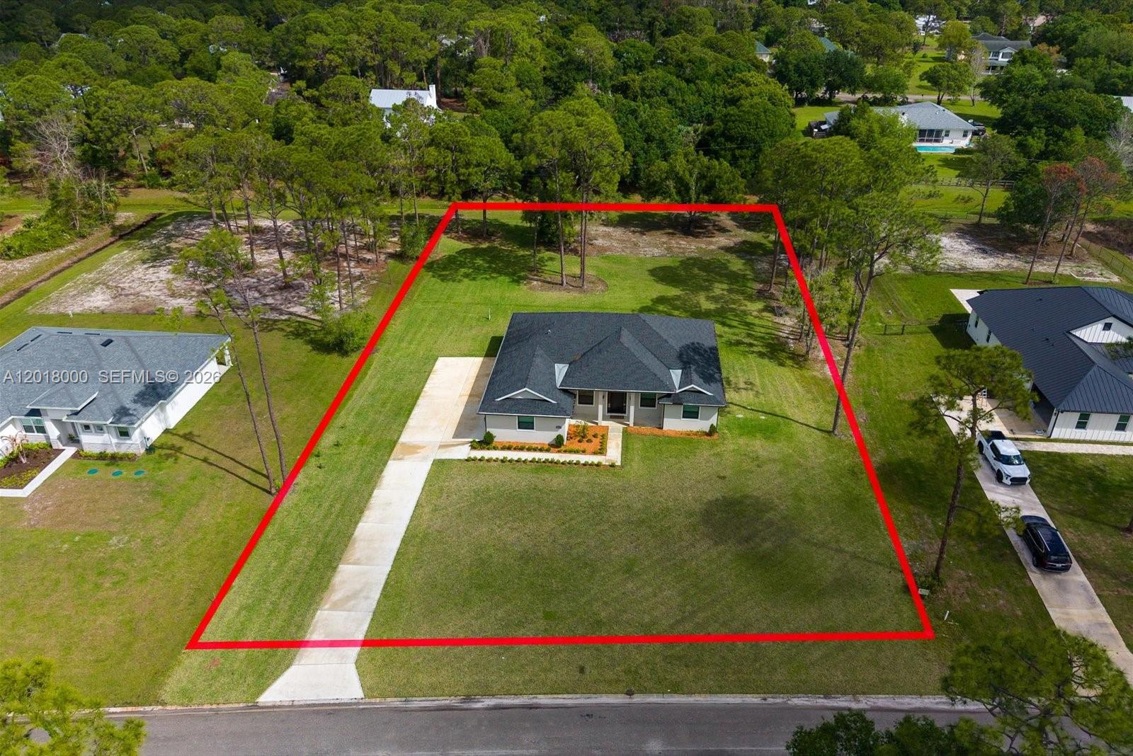 Pine Hollow Beauty! Custombuilt home on 1.04 acres offering 3 bedrooms, 2 bathrooms, and an extra room. Enjoy a 3-car garage and an expansive back porch with tongue-and-groove ceilings plus a convenient cabana bath. Wood-look tile runs throughout. The spacious primary suite features a french door to the patio and a large en-suite bath with dual shower heads. The kitchen shines with quartz countertops, shaker cabinetry with soft-close drawers, and an 8-foot island. Upgrades include 8-foot shaker doors throughout and an electric fireplace.