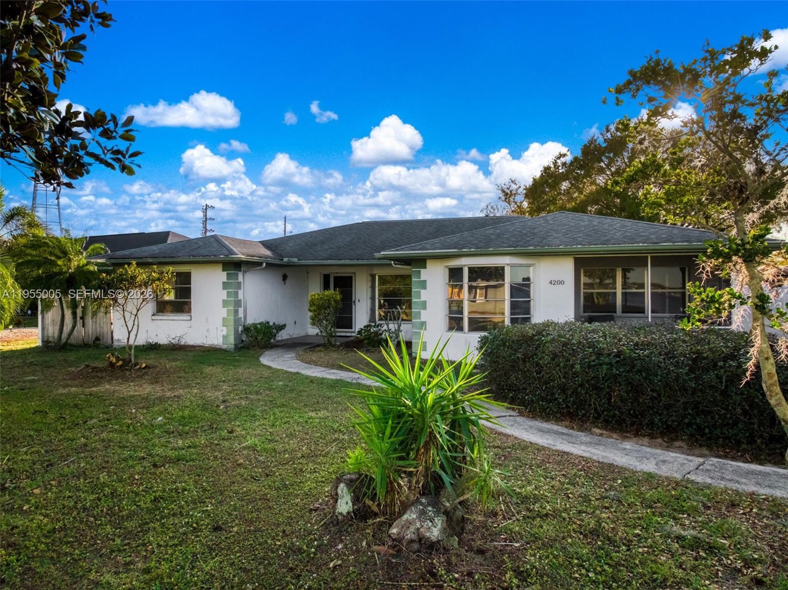 HANDYMAN SPECIAL in Sebring, Florida. Sebirng is in the heart of Florida and only a few hours away from the coast.We are known for our recent HGTV makeover, our auto races at the Sebring International Raceway, golfing, parks, and our over 100 named lakes in the county. Speaking of lakes- check out your lake views without the lake taxes! Yes, this home is on Lakeview Drive so enjoy those blue waters across the street and enjoy Veteran's Beach and the public boat ramp which is only 6 houses down the road. City water and city sewer. POOL HOME. HANDYPERSON SPECIAL.