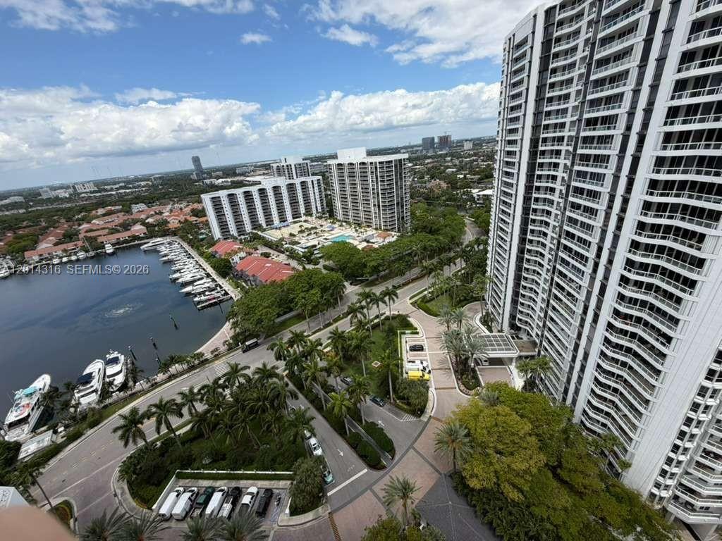 BEAUTIFULLY UPDATED 3 BED / 2 BATH CORNER UNIT IN ONE OF AVENTURA’S MOST DESIRABLE BUILDINGS. FEATURES NEW FLOORS THROUGHOUT, NEW APPLIANCES, UPDATED KITCHEN AND BATHROOMS, GRANITE COUNTERTOPS, AND A PRIVATE LAUNDRY ROOM. ENJOY TWO BALCONIES WITH WATER VIEWS OF THE MARINA AND INTRACOASTAL. PRIME LOCATION NEAR WATERWAYS MARINA, PARK, TARGET, WHOLE FOODS, AND ELIGIBLE FOR CHARTER SCHOOL OF AVENTURA. COMMUNITY AMENITIES INCLUDE 3 POOLS, 4 TENNIS COURTS, BBQ AREAS, AND DIRECT ACCESS TO WATERWAYS MARINA
