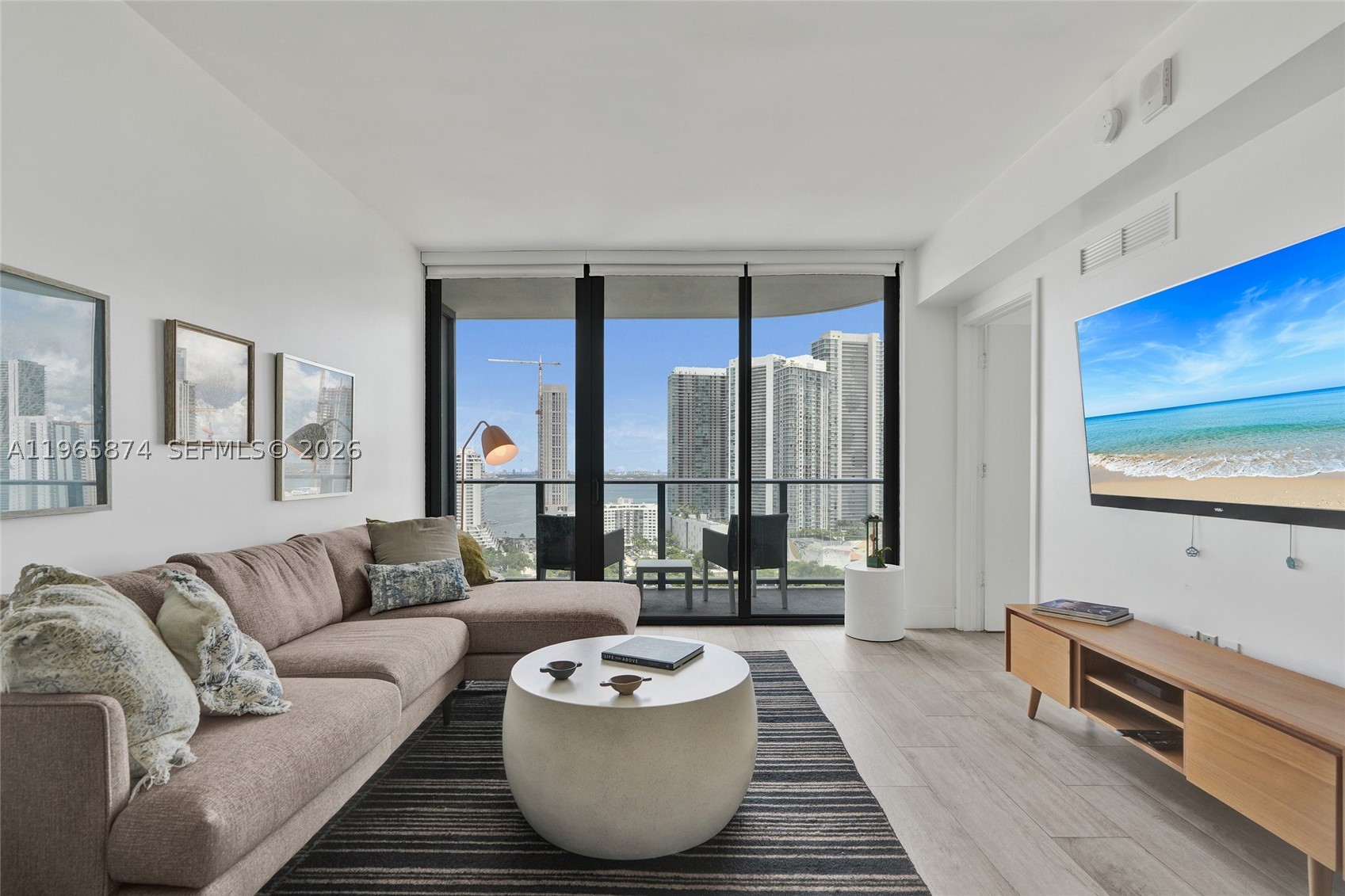 MIDTOWN-MIAMI EXCLUSIVE BUILDING! 1 BEDROOM +DEN AND 1+1/2 BATHS CONDO WITH BAY AND OCEAN VIEWS IN THE EAST SIDE OF THE CONDO. EUROPEAN KITCHEN, WASHER AND DRYER INSIDE THE UNIT AND A GREAT BALCONY TO ENJOY THE VIEW. EXCELLENT AMENITIES FOR RESIDENTS ONLY USE AS WELL AS ACCESS TO THE HOTEL'S AMENITIES. NEW GYM, HEATED POOL WITH PRIVATE CABANAS,  TENNIS COURT AND MINI GOLF, MEETING ROOMS, MEDIA ROOM, TENNIS, CHILDREN'S ROOM, BUSINESS CENTER AND SPA. CENTRALLY LOCATED WITH PLENTY OF NEARBY RESTAURANTS AND SHOPS. EASY ACCESS TO HIGHWAYS AND CLOSE TO THE AIRPORT.