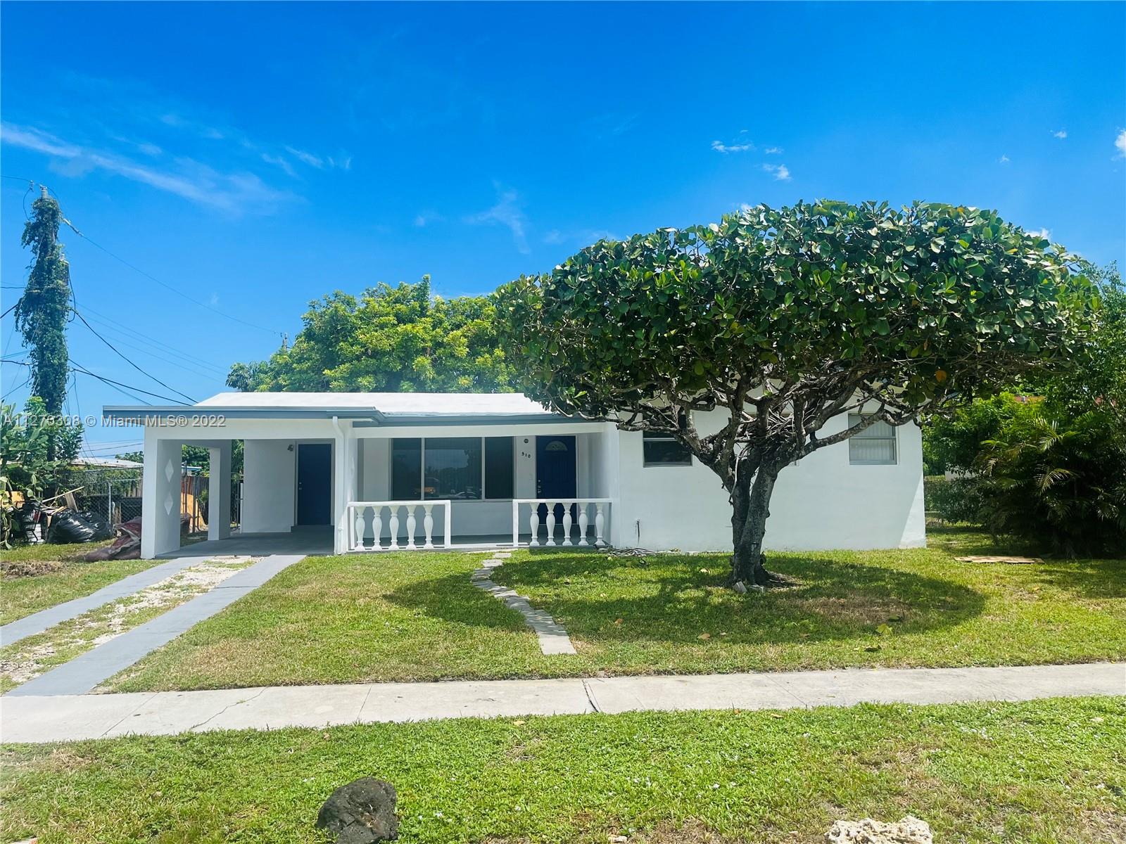 Single Family Home in the heart of Fort Lauderdale 4/2 spacious open concept, newly renovated, high gloss kitchen cabinets, quartz counter tops with waterfall. Master has an independent entrance for privacy, which can separate the house and produce income. The circular tree in the front provides a nice touch to the house. Cover carport (close it and add sqf to the house) large back yard, room for a pool, fruit trees and also there is a concrete slab in the back to put chairs and entertain friends and family.
