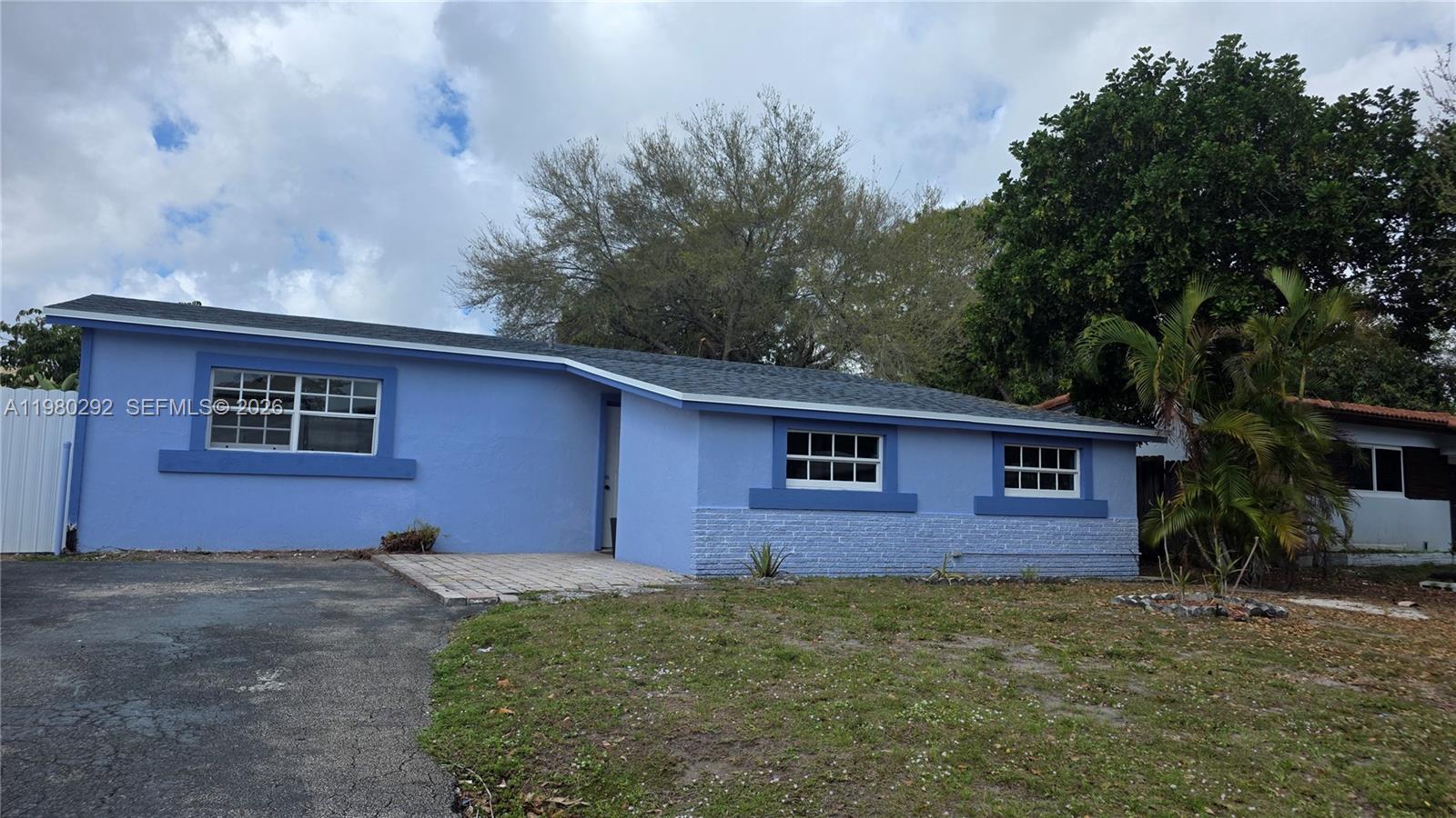 Stunning 3/2 Pool Home in Hollywood, FL- Spacious Oasis in Sunshine Park Estates. Discover your perfect rental in this beautifully maintained 3-beds, 2-baths single-family home located in the desirable Sunshine Park Estates, Hollywood, with spacious driveway with parking for up to 4 vehicles. Key Features & Upgrades: Outdoor Paradise=> Enjoy an oversized front yard and an expansive, private backyard oasis featuring a massive 413sf swimming pool. Best of all, ensuring you can enjoy a pristine, sparkling pool all year round without the hassle. Energy Efficient=> Recently updated with a new roof and upgraded insulation to keep the home cool and reduce energy costs during Florida’s warmer months. Outdoor Living=> Relax on the large covered and semi-covered patio, surrounded by mature, lush landscaping that provides natural shade and privacy. Bright Interior=> Experience an inviting, open-concept floor plan with sleek tile flooring throughout, generous natural light, and a highly functional kitchen layout. Prime Location=> Situated on a quiet, peaceful street, you are just minutes away from the Seminole Hard Rock Hotel & Casino, major highways (I-95/Turnpike), top-tier shopping, and dining. Peace of Mind=> Conveniently located near a local police substation, ensuring a secure & quiet residential atmosphere. This rare gem won’t last long! Experience the best of Hollywood living. Schedule your private tour today.