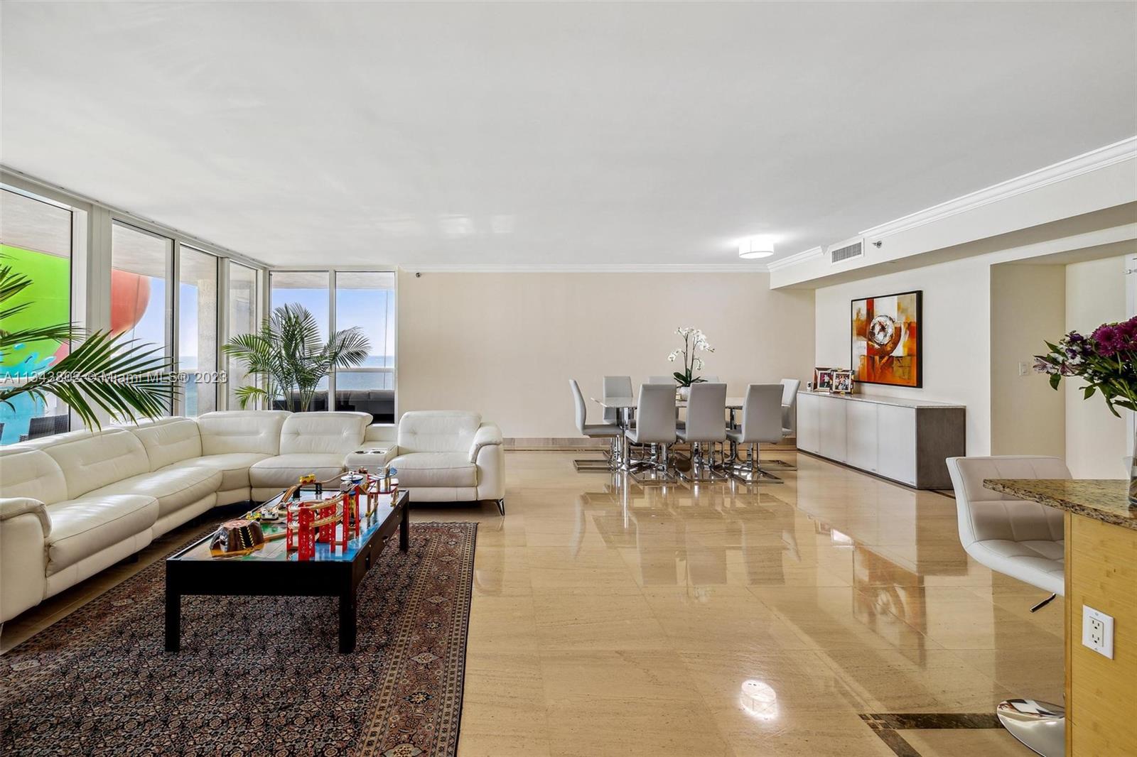 Beautiful completely furnished corner unit with 1,782 sq. feet. 2 bedrooms, 2 baths, with over 450 sq. ft. wraparound Balconies. King bed in master bedroom and queen bed in second bedroom. Model C, NE Corner with Ocean & Intracoastal views from your two private balconies. Designer finishes, Jacuzzi in master bathroom, European style kitchen and Kitchen Aid appliances. Resort style amenities. Infinite edge pools, full service spa, 50,000 sq. ft. fitness center overlooking the ocean.