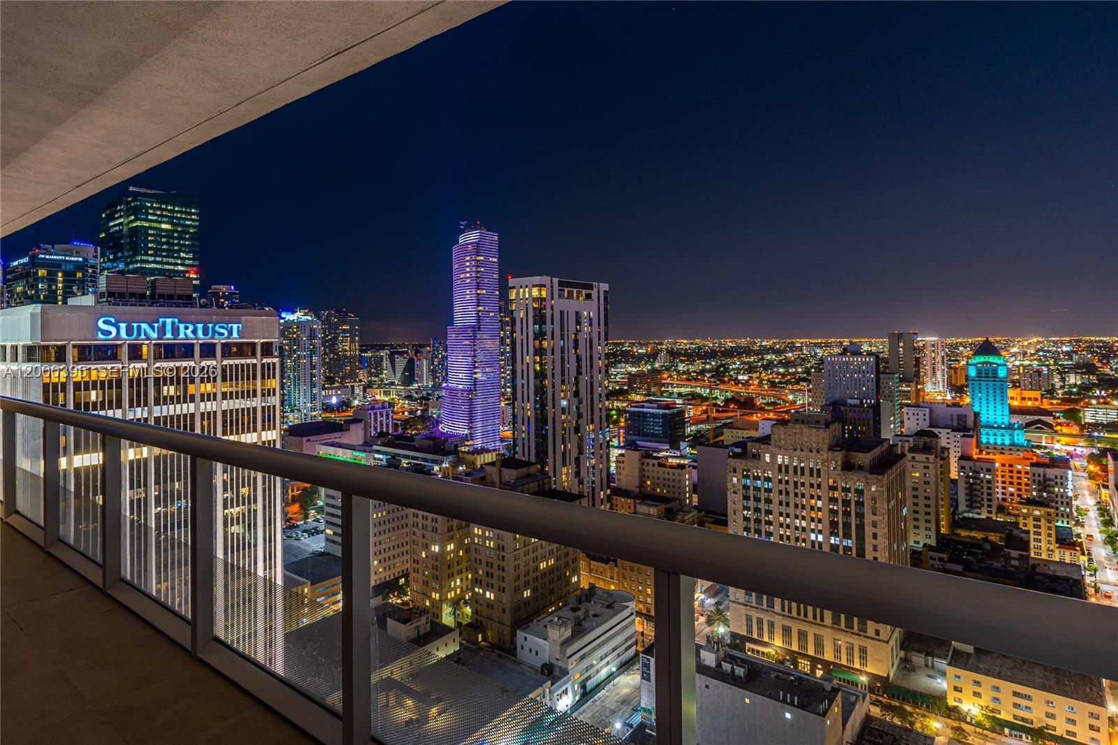 Experience refined Downtown Miami living in this sophisticated high-floor corner residence at the iconic 50 Biscayne. This home offers sweeping water and city views, a spacious split layout, and polished 32x32 high-end white porcelain floors. The sleek kitchen features Calacatta Italian marble surfaces with a waterfall island and premium cabinetry. Tasteful bathrooms include a jacuzzi tub and glass-enclosed shower. World-class amenities include a grand 3-story lobby, a 2-level club room with kitchen, billiards, a business center, and a heated Olympic infinity pool with cabanas and hot tub. Stay active in the 2-level fully equipped fitness and spa offering meditation and Pilates. Additional services include 24/7 concierge and security. Prime location steps from Whole Foods, Bayfront Park, Brickell Centre, museums, and fine dining. Beyond the immediate luxury of the unit itself, residents enjoy an unparalleled urban lifestyle where the vibrant energy of the city meets the serenity of the waterfront. The building's architectural significance is matched only by its proximity to the cultural heart of Miami. Whether you are hosting a formal gathering in the expansive club room or enjoying a quiet morning on your private balcony overlooking the bay, every detail of 50 Biscayne is designed to cater to a discerning lifestyle. This is a rare opportunity to own a piece of the skyline in one of the most sought-after addresses in the district, blending convenience, comfort, and style.