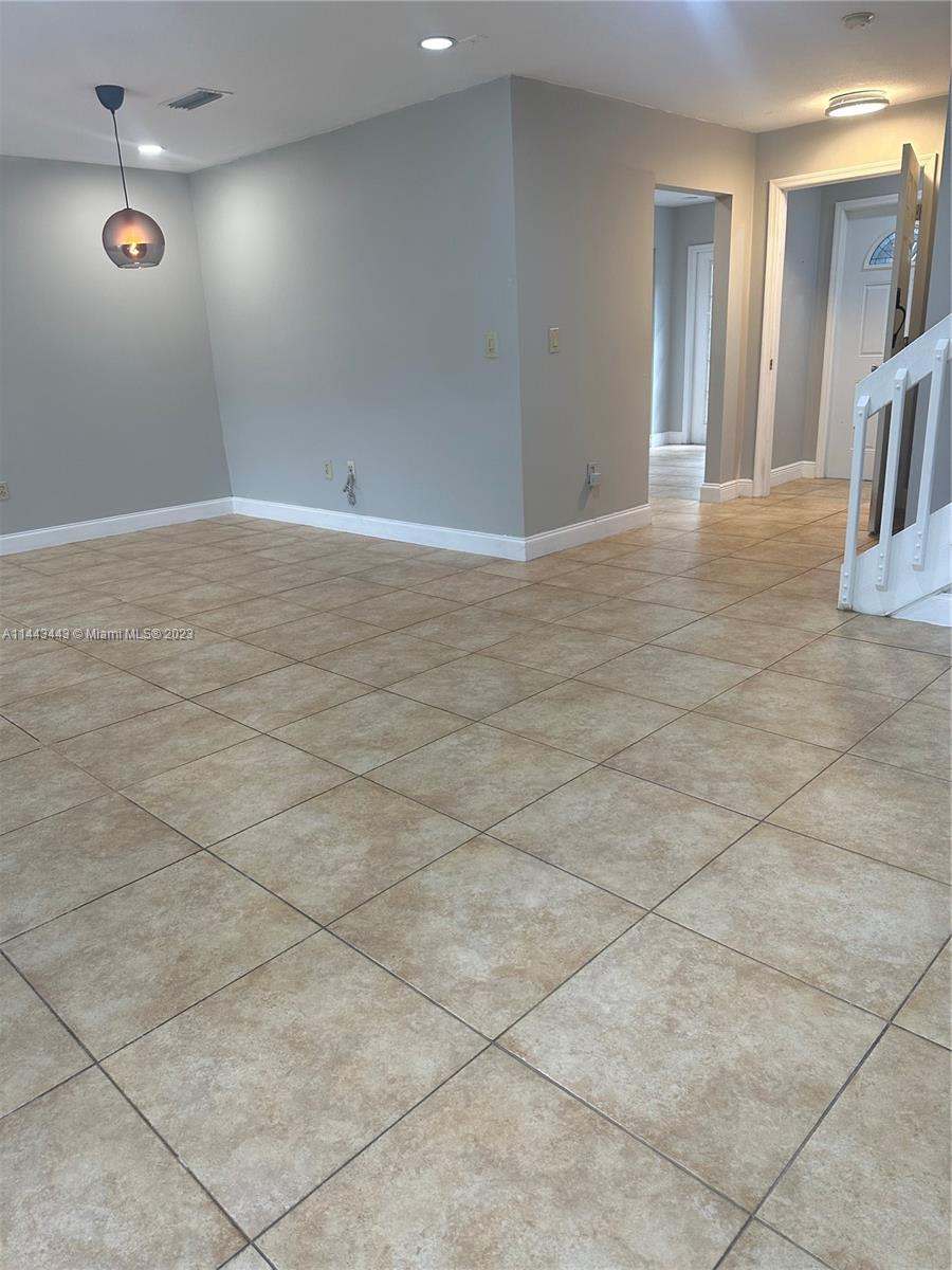 Welcome to your new home in Place Royale, Kendall, Miami! This 4-bedroom residence features: Smart layout with 1 bedroom and an office on the ground floor. 3 bedrooms on the second floor. The principal bedroom is spacious & it has a walk-in closet. 3 full bathrooms (1 on the ground floor, 2 on the second floor)Laundry room with a sink & space for a washer/dryer to be installed as per tenant's request.  2 patios (front & back). It has a bright & ample kitchen with a pantry, & granite countertops. Porcelain tile in the first floor & laminate floors in the second. 2 parking spaces in front, plus guest parking. Conveniently located near Baptist hospital, Walmart, Publix, restaurants, & shopping centers. All only single minutes away!!