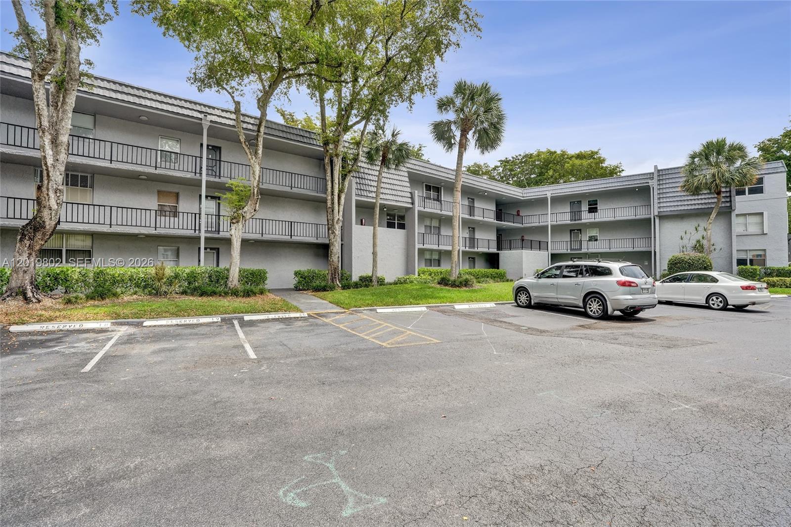 WOW! IF YOU HAVE SEEN THE REST, COME SEE THE BEST BUY IN LIME BAY ON THIS RARELY AVAILABLE FIRST FLOOR UNIT WITH GOLF AND WATER VIEW! ABSOLUTELY CHARMING UNIT WITH UPDATED KITCHEN, LAMINATE FLOORS IN LIVING, DINING, AND BEDROOMS, NEW A/C 2028, AND  ACCORDION SHUTTERS! GREAT LOCATION STEPS TO THE ASSIGNED PARKNG SPACE! ACTIVE 55+ COMMUNITY WITH CLUBHOUSE, COMMUNITY POOLS, TENNIS, AND MORE!