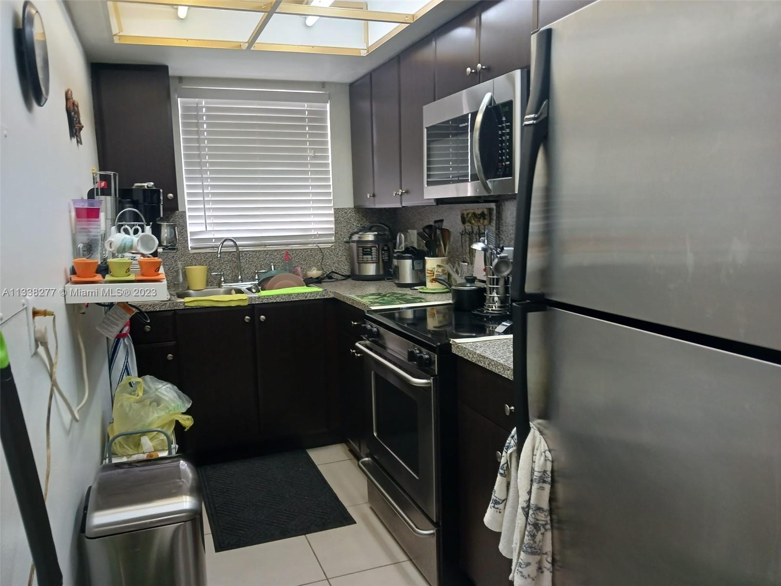 VILLAGE AT DADELAND CONDO - Residential