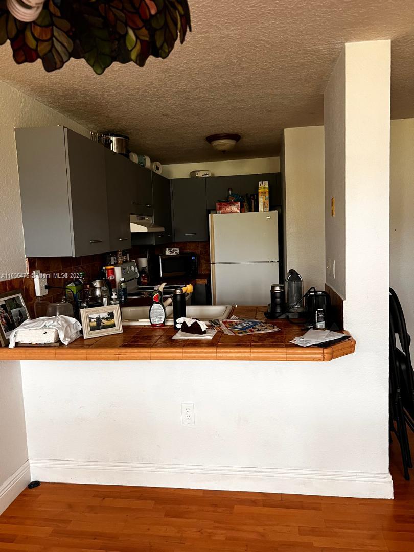 PALM GARDENS CONDO - Residential Lease