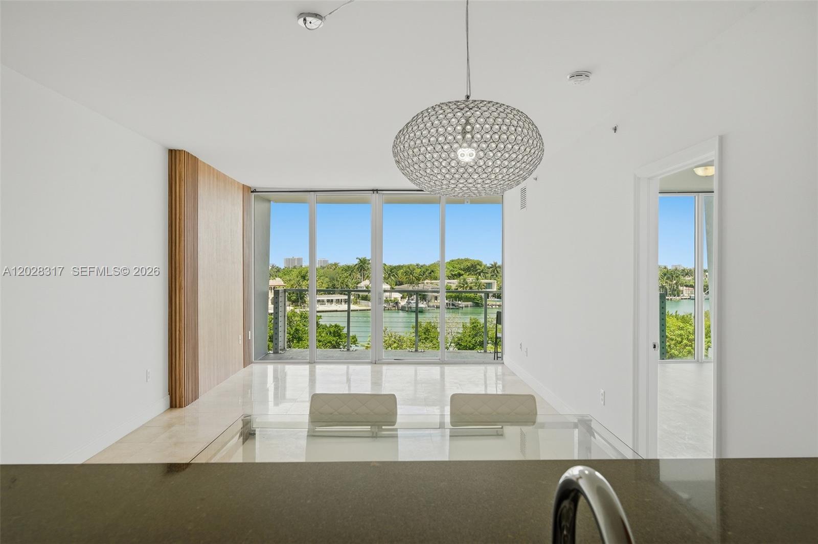 Spacious and bright 2-bedroom, 2-bathroom residence with beautiful direct bay views in a boutique Miami Beach building. This well-maintained unit features elegant marble floors throughout, a generous open living and dining area, and the convenience of an in-unit washer and dryer.
Enjoy tranquil water views and a functional layout that offers both comfort and privacy. Ideally located on Indian Creek Drive, directly across the street from the ocean , Allison island and Miami Beach's beautiful sandy beaches. Just minutes from South Beach, Bal Harbour, premier dining, shopping, and entertainment, with easy access to major roads.