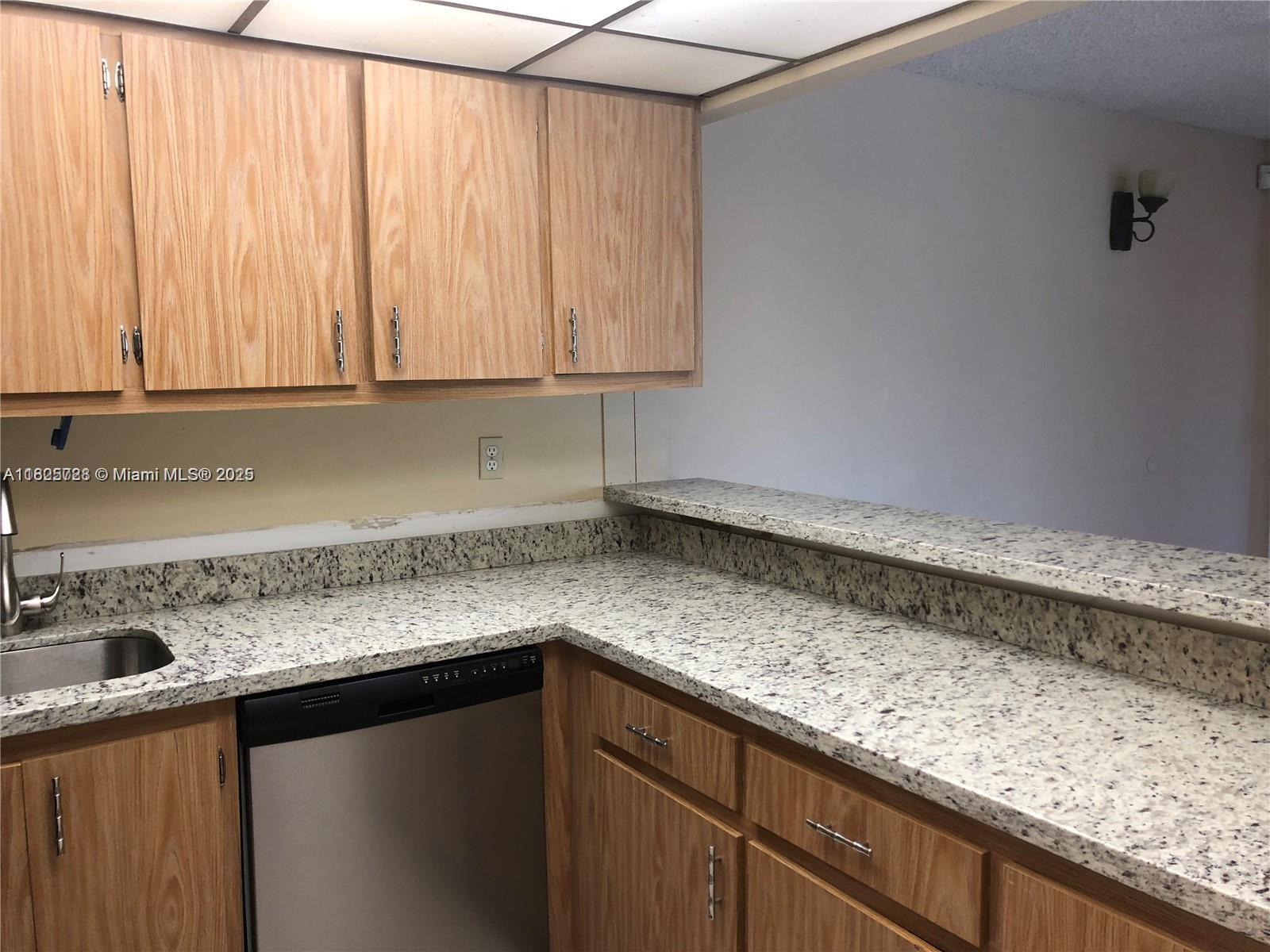 Great investment opportunity. Great long term tenant in place until August 3, 2025 paying $2,000 per month providing immediate income. This well-maintained 2/2 plus den features a functional layout with tile floors throughout living room and laminate flooring in bedrooms, a bright living area, and a private balcony. Centrally located near major highways, shopping, and schools. The community offers a pool, laundry facilities, and assigned parking. Low HOA. Don't miss out on this turnkey property with great potential in a convenient location.