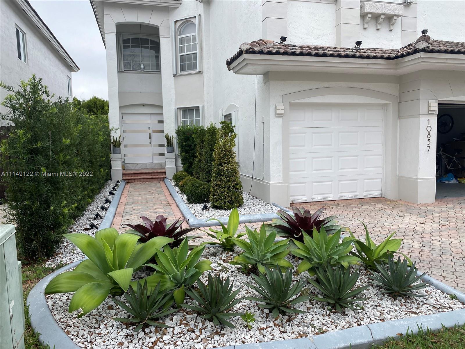 READY TO MOVE IN, NO ASSOCIATION APPROVAL REQUIRED   Fabulous Martinique isle in Doral Isles...6 Beds/ 3 full baths... Impeccable condition. New roof 2022.  New air condition units 2021.  Accordion shutters. Does not include audio system.  Enjoy living in Doral Isles, beautiful club house with gym and 2 pools, etc. etc.