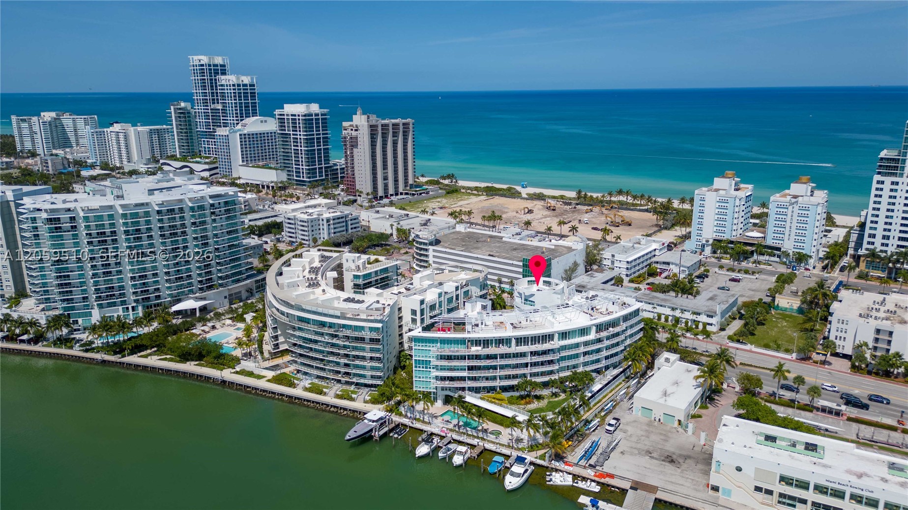 Live and Experience the Beach Life in a Nice & Safe Community of Regatta Condominium. Discover this exclusive 2Beds 2baths sitting in a 1,165 Sqft of living space with spectacular panoramic views. This corner Unit on the 5th floor offers ocean, city and skyline views. Featuring: Modern kitchen, Ceramic floors, Master bath with shower and whirlpool tub, plenty of closets, wrap around balconies and blackout curtains. Regatta also offers, waterfront pool, gym, marina, dock available, sauna, concierge and 2 assigned Tandem garage parking.