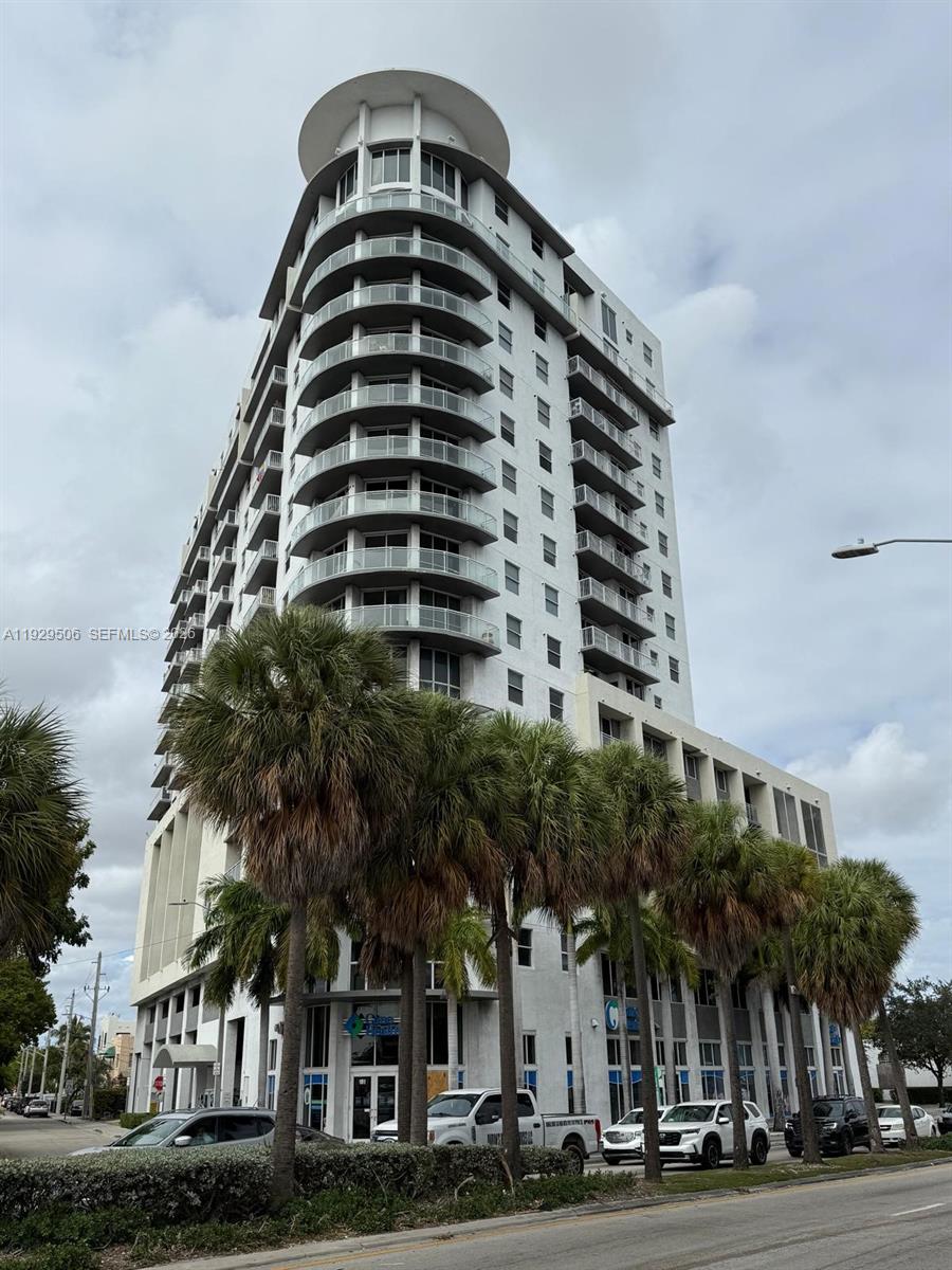 Spacious 2-bedroom, 2-bath loft-style condo in Altos de Miami offering 1,477 sq ft of bright, open living. This two-story residence features double-height ceilings, floor-to-ceiling windows, and an expansive living area with excellent natural light. Open kitchen with ample cabinetry. Second-level loft overlooks the living space; both bedrooms offer privacy and generous closets. Modern flooring throughout. Well-maintained building in a central Miami location close to major highways, medical centers, shopping, and dining. Washer/dryer in unit and assigned parking. One of the larger 2-bedroom layouts in the building.