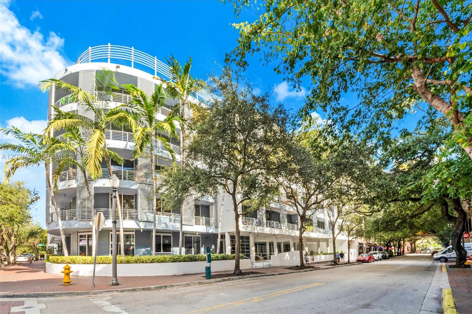 Live in the center of it all at the highly sought-after Lofts at Mayfair in the heart of Coconut Grove. Perfectly positioned across from the iconic Mayfair House Hotel & Garden and just steps from CocoWalk, this residence offers one of the Grove’s most convenient and walkable lifestyles. Enjoy immediate access to acclaimed restaurants, sidewalk cafés, boutique shopping, fitness studios, parks, marinas, and vibrant nightlife—all just moments from your front door. This light-filled 1-bedroom, 1-bath residence features 9.5-foot ceilings, impact windows and doors, and a private terrace ideal for enjoying the Grove’s tropical atmosphere. The spacious bedroom includes a walk-in closet, while the open-concept kitchen is appointed with stainless steel appliances and flows seamlessly into the living and dining areas. Located in the highly desirable 05 line, the unit offers exceptional privacy with no shared walls between neighboring residences. Additional highlights include one assigned garage parking space—an invaluable convenience in Coconut Grove—and the rare opportunity to own the only available residence currently for sale at Lofts at Mayfair. Residents enjoy access to a pool, fitness center, and secure building amenities. Surrounded by lush parks, Biscayne Bay marinas, and the Grove’s historic charm, this residence delivers the perfect blend of urban convenience and tropical living in one of Miami’s most beloved neighborhoods.