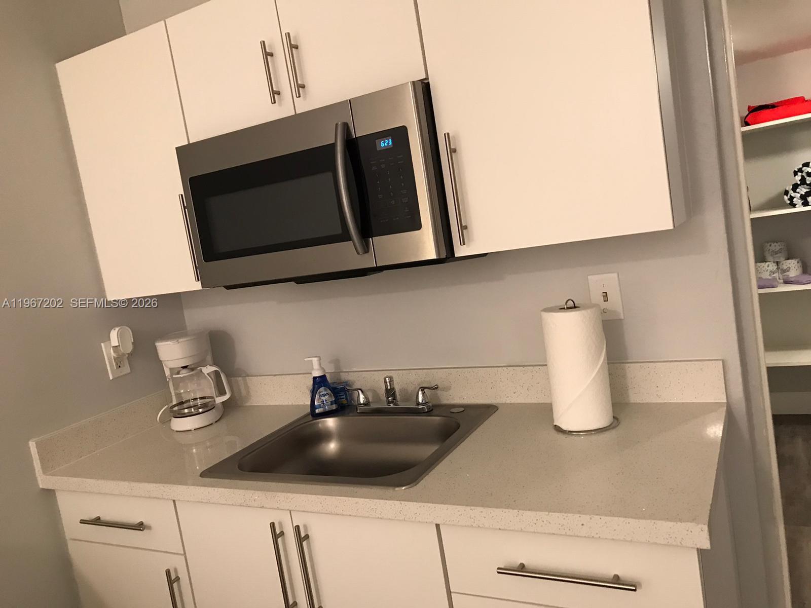 Excellent investment opportunity! Renovated poolside studio on ground floor with no rental restrictions. Rent daily, weekly, or monthly—independently or through hotel program. Utilities included (electricity, water, cable) plus full amenities: gym, restaurant, laundry, heated pool & 24-hour lobby. Walk to the beach and shopping. Direct canal access to ocean. High vacation rental demand.