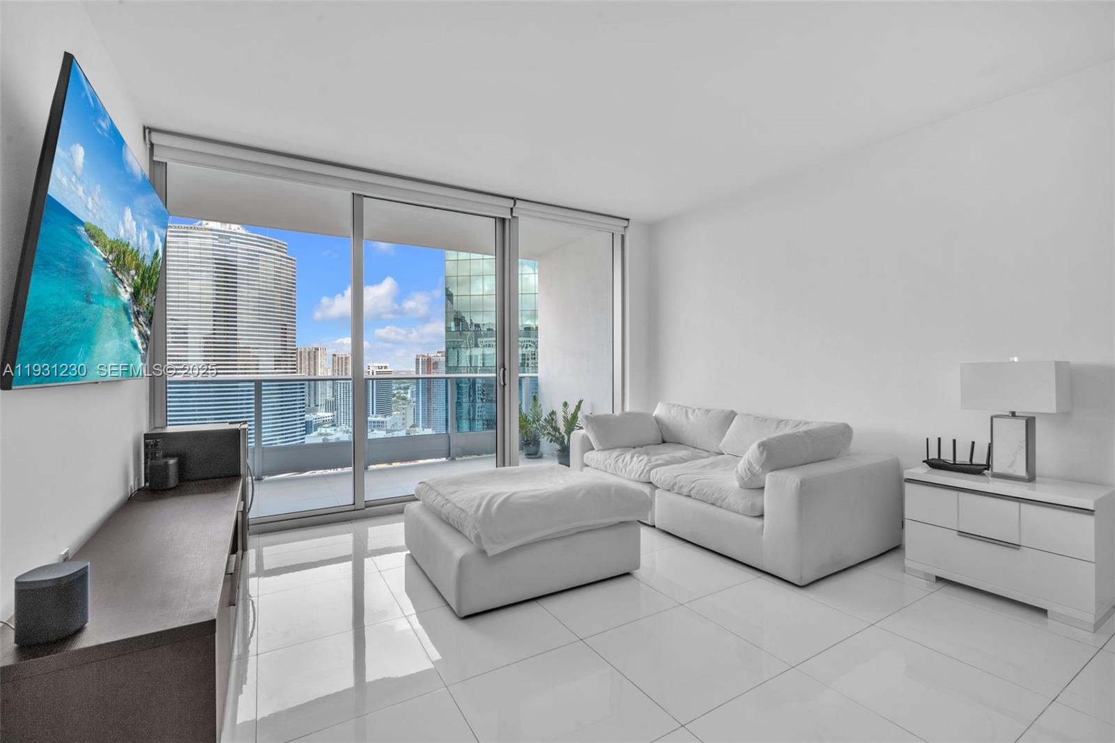 Discover elevated luxury in this 1-bedroom, 1.5-bath penthouse on the 40th floor of Epic, one of Miami’s most exclusive addresses. Featuring top-tier finishes throughout, the residence offers a Snaidero kitchen with Miele appliances, a Sub-Zero refrigerator, Italian flooring, marble bathrooms, custom closets, and a 178-sq-ft balcony with sweeping 180° panoramic city views. Enjoy VIP access to Joia Beach Club, 15% discounts at Zuma, Hell’s Kitchen, and Novikov, complimentary tickets to Silverspot Cinema, as well as spa services, in-room dining, and resort-style pools. Just steps from Whole Foods and Brickell City Center. Schedule your private showing today.
