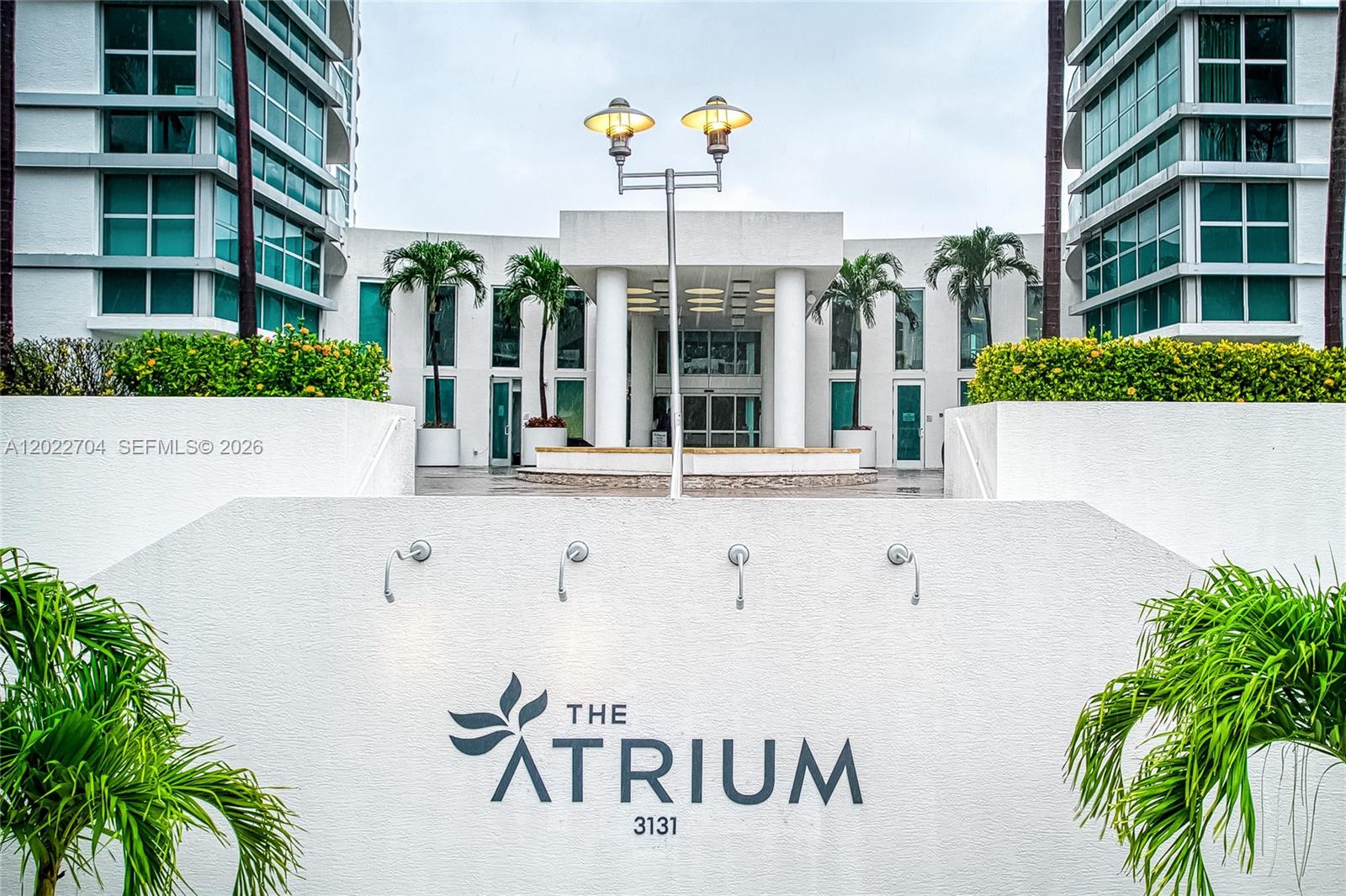 Experience luxury resort-style living in this stunning 2-bedroom, 2.5-bath residence at Atrium Condo. This beautifully designed unit features an open-concept kitchen with granite countertops, top-of-the-line appliances, a breakfast bar, a formal dining area, ceramic flooring throughout, a spacious balcony, and generous closet space. Floor-to-ceiling windows showcase breathtaking waterway and city views, filling the home with natural light. Residents enjoy exceptional amenities, including a recreational area, a full-service marina, an infinity pool, a jacuzzi, a children’s play area, and a state-of-the-art fitness center. Ideally located just minutes from the beach, premier shopping, and fine dining, this residence offers the perfect blend of comfort, convenience, and elegance. On-site management provides added peace of mind and excellent service. Whether you are searching for a primary residence, seasonal retreat, or investment opportunity, this exceptional home is a perfect choice.