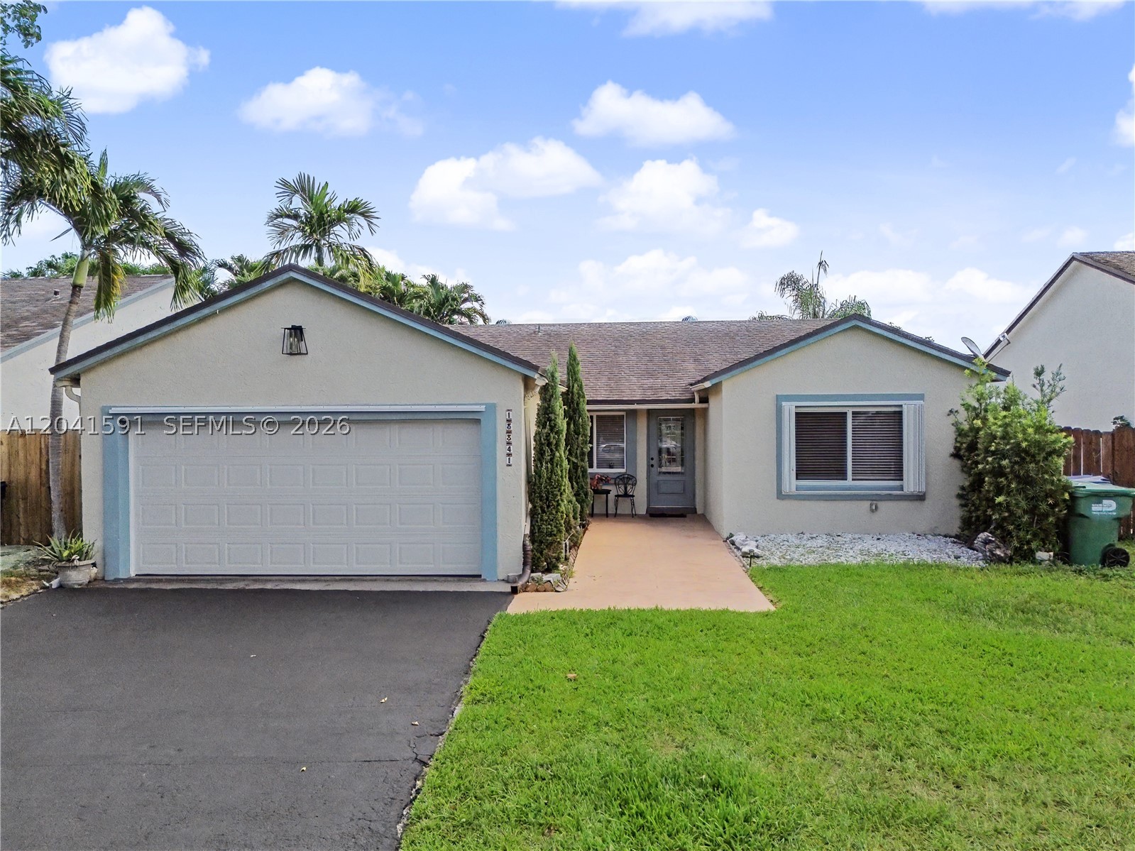 Centrally located single family home located in the sought after Edgewater community.  The home features 3 bedrooms and 2 bathrooms.  The two car garage has been converted into a climatized workshop or den, with separate storage up front.  The hurricane impact garage door remains in functioning order, giving you various options.  Roof was redone in 2020. Your back yard features concrete terraces to enjoy nature, plus 2 sheds for additional storage. This house has the added convenience of being located in front of the community park,  so you do not have any front neighbors, nor much traffic on your street.  For the low association fee of $118 per month, you get access to the community park which features a pool, playground, clubhouse and sports courts,  all located outside your front door.  Conveniently located near major highways for easy commute.