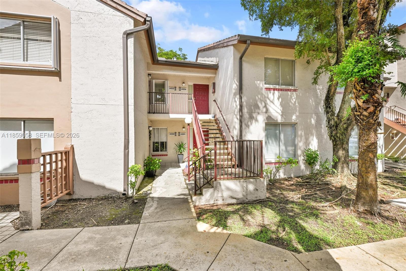 Discover this inviting 1-bedroom, 1-bath residence in the desirable Parc Vista community of Kendall. Surrounded by lush, tree-lined streets, residents enjoy access to resort-style amenities including a fitness center, tennis courts, and multiple sparkling pools. This bright and airy unit offers vaulted ceilings, abundant natural light, and serene views of the tennis courts and landscaped courtyard. The bathroom features high-quality finishes, while the kitchen is appointed with quartz countertops and tile flooring throughout. A convenient in-unit washer and dryer set, spacious screened balcony, and utility closet add everyday comfort and storage. Comes with one assigned parking space plus ample guest parking.