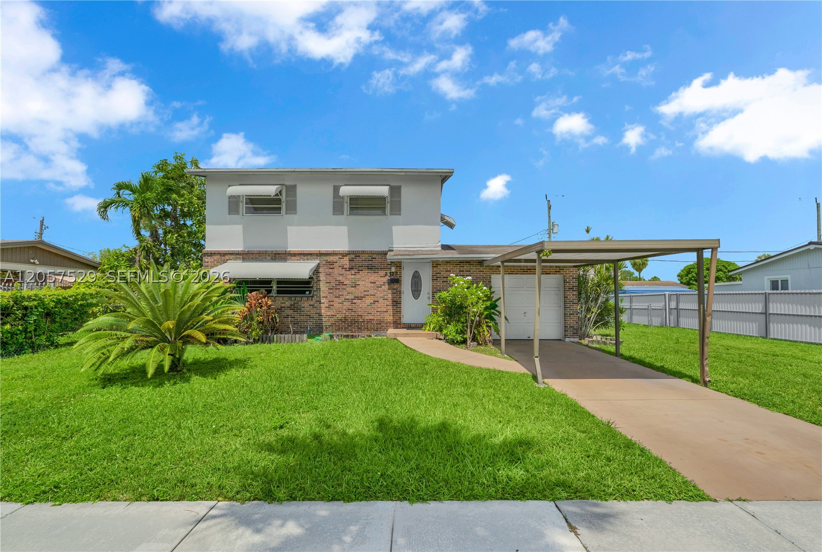 Unique opportunity to own this hard-to-find property in a well-established West Dade neighborhood! This two-story home offers incredible potential and features a desirable floor plan with the primary bedroom, and a full bathroom conveniently located on the first floor. Enjoy separate living and dining rooms, an oversized kitchen, and an enclosed screened patio that's perfect for relaxing while overlooking the spacious backyard. The property also includes a one-car garage and offers the potential to create a private in-law suite with its own separate entrance. Bring your vision and make this home your own. Don't miss this incredible opportunity!