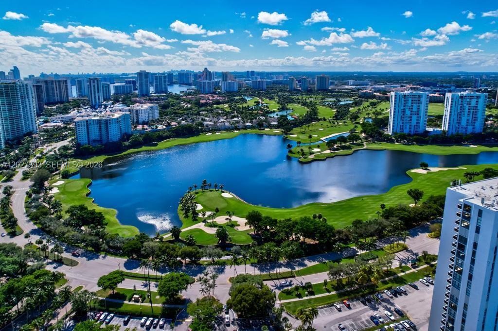 Corner unit with water views from every room. Renovated 2 beds/2 baths in the sought after Golf Course Aventura area. Washer and dryer in unit. Simply spectacular!
