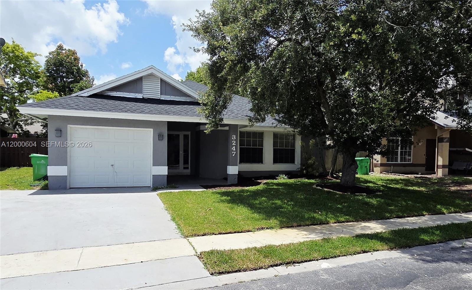 Bright and well-maintained home in a quiet, established neighborhood with a welcoming atmosphere and great curb appeal. The interior offers a comfortable flow with abundant natural light, creating an open and inviting feel throughout the main living areas. The kitchen is functional and well-positioned, ideal for everyday use and easy entertaining. The property features a private backyard with plenty of space to relax, host gatherings, or enjoy outdoor living year-round. Located just minutes from Sawgrass Mills, major highways, dining, and shopping, offering excellent convenience for daily life and commuting. The community is known for its peaceful surroundings and accessibility to parks and essential services. A great opportunity for tenants seeking comfort, location, and a well-cared-for home in a desirable area.