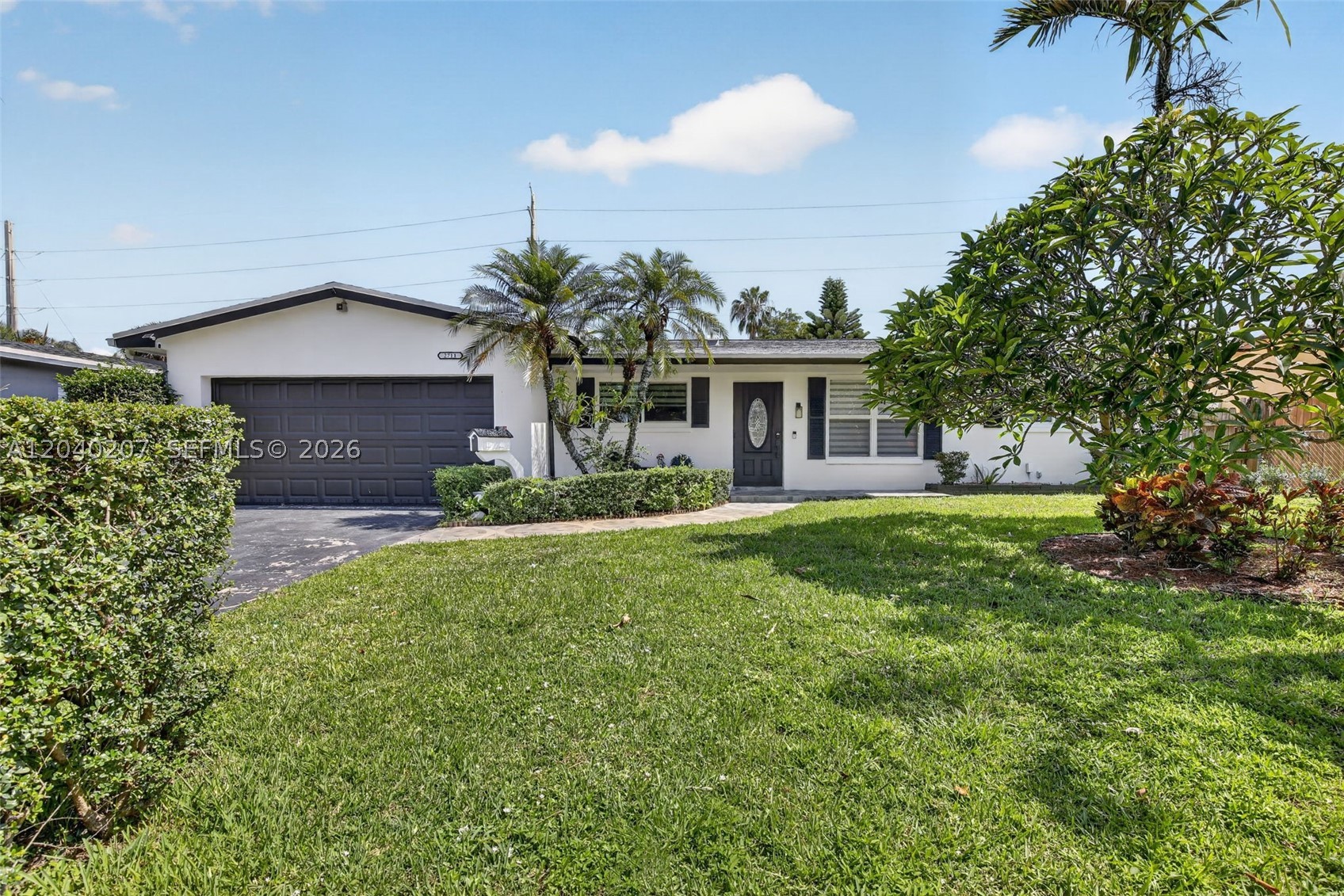 Located in the desirable Sunset Isles neighborhood with no HOA, this unique property offers a combination of updated living space, flexible guest accommodations, and exceptional outdoor amenities. The main home features 3 bedrooms, 2 updated bathrooms, upgraded flooring, custom closets, updated plumbing and sewer lines, and a remodeled kitchen outfitted with commercial-grade appliances. A converted garage creates private guest or in-law quarters complete with a bedroom, full bath, refrigerator, microwave, and dining/preparation area. The backyard is designed for entertaining, highlighted by a saltwater pool with Diamond Brite finish, outdoor kitchen and BBQ area, decorative pavers, and multiple gathering spaces. Adding to the property's versatility is a detached pool house featuring a recreation room, full bathroom, and laundry area. Two storage buildings provide additional space for equipment, hobbies, or seasonal items. Conveniently located near beaches, shopping, dining, parks, and major commuter routes, this property offers the flexibility, space, and lifestyle opportunities that are increasingly difficult to find.