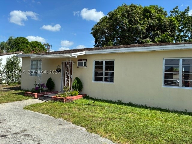 Centrally Located. This original 2 bedrooms 1 bath has expanded to 3 bedrooms and 2 baths. The property has a very good size lot with tropical fruit trees.
Owner will contribute at closing $10,000 toward repairs if FULL LISTED PRICE  is offered.