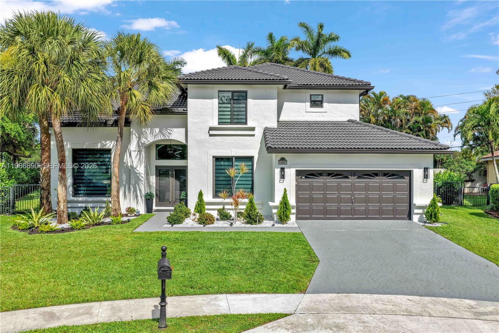 Exquisite, fully renovated residence showcasing a sleek modern-contemporary design. The home features impact windows and doors, impeccable craftsmanship, and high-end finishes throughout. Highlights include striking floating stairs, elegant porcelain flooring, designer bathrooms, and premium modern appliances. This turnkey property offers the perfect blend of sophistication and comfort. Don't miss the opportunity to explore this gem in person

Ideally located within an exclusive gated community in West Boca, known for top-rated schools, a secure environment, and close proximity to fine dining, shopping, and everyday conveniences.