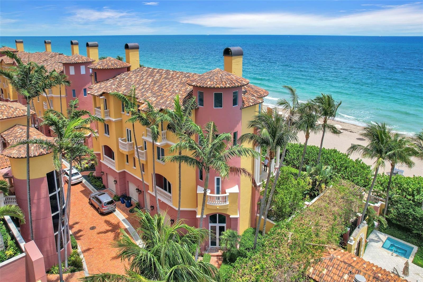 Step into unparalleled luxury, a waterfront masterpiece perfectly situated on the sun-kissed sands of FTL Beach. This 5-bed, 5.5-bath villa offers breathtaking ocean views through expansive windows that flood the home with natural light. The first floor features a private cabana suite, perfect for guests or a tranquil retreat. At the heart of the villa lies a gourmet kitchen, ideal for hosting unforgettable gatherings. Each bedroom is a haven of comfort, paired with spa-inspired baths for ultimate indulgence. Outside, a lush private garden creates a serene oasis for relaxation or recreation. Located in the exclusive Palms community, this villa seamlessly blends sophistication, comfort, and nature’s beauty. Experience the pinnacle of beachfront living in this coastal sanctuary.
