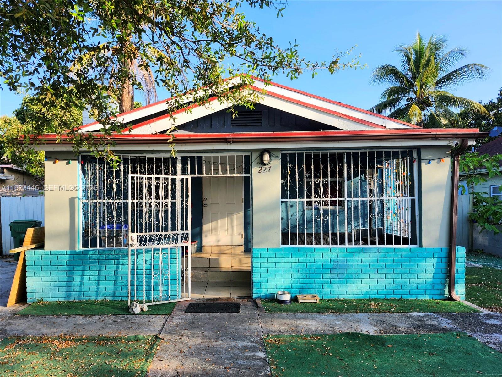 Prime Development Opportunity in Wynwood Norte. T4R zoning permits up to 4 stories, 17 residential units, and 70% lot coverage. Property qualifies for zero parking requirement under NRD-2. Located steps from Midtown Miami, the Design District, and the Wynwood Arts District. Rear alley is designated by the City for a future bike-path park. Highly walkable location near galleries, shops, dining, and major highways. Currently rented on a month-to-month basis, providing a covered land opportunity while plans are prepared. Please do not disturb tenants. Contact listing agent for additional details and showing instructions.