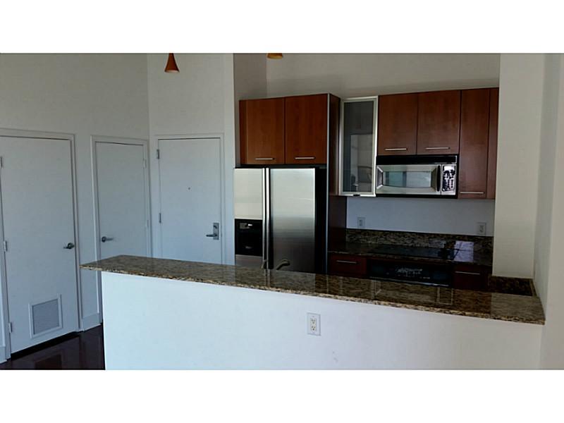 Beautiful loft style 1BD/1BA condo located in Downtown Dadeland.  Loft features open design, wood kitchen cabinets, granite countertops, Stainless Steel appliances, wood floors, washer and dryer in unit. Metropolis I features a pool, Jacuzzi, Gym, full se curity, concierge, club house, and valet.  Walk to Dadeland Mall, Metro Station, restaurants.