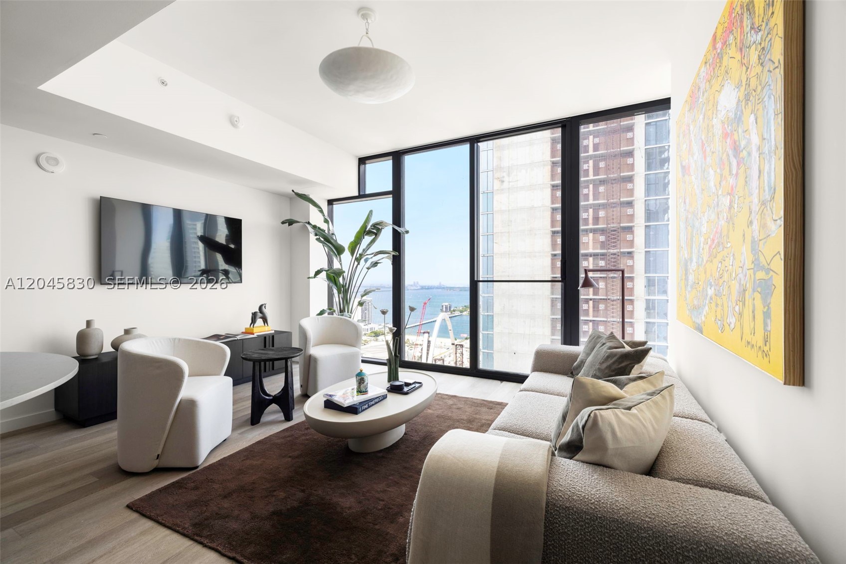 Experience elevated urban living at E11EVEN Residences, one of Downtown Miami’s most sought-after luxury lifestyle destinations. This beautifully appointed turnkey residence features floor-to-ceiling windows, wide-plank wood flooring, premium finishes, designer furnishings, and a sleek contemporary kitchen with integrated Wolf and Sub-Zero appliances. The spacious layout blends modern elegance with everyday functionality while offering captivating city and bay views. Owners enjoy world-class amenities including a resort-style pool deck, state-of-the-art fitness center, concierge, valet, spa, restaurants, and direct access to the vibrant E11EVEN lifestyle. Flexible ownership with short-term rental capability creates an exceptional opportunity for both personal enjoyment and investment. Ideally located moments from Miami Worldcenter, Brightline, Kaseya Center and the Arts & Entertainment District.