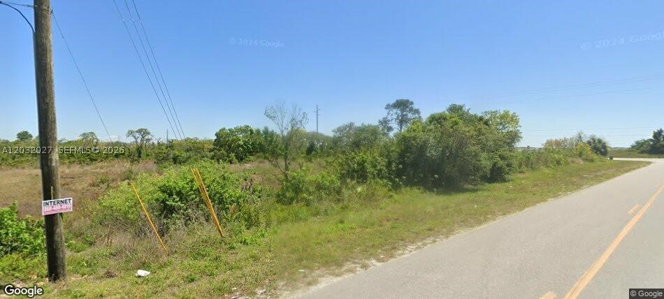 Vacant 0.63-acre wooded residential lot consisting of approximately 27,500 square feet (100' x 275') in the Sunn Lakes Estates area of Lake Placid. Zoned AU and currently undeveloped, the property offers space for a single-family residence or other permitted uses subject to county regulations. Conveniently located near local shopping, dining, schools, parks, golf courses, and the area's many lakes and recreational opportunities.

Buyer is responsible for verifying zoning, permitted uses, building requirements, utility availability, environmental conditions, flood zone designation, and all development-related information with Highlands County. Well and septic may be required.

Lot Size: 0.63 Acres (27,500 SF) | Zoning: AU | Wooded Lot | Undeveloped Land