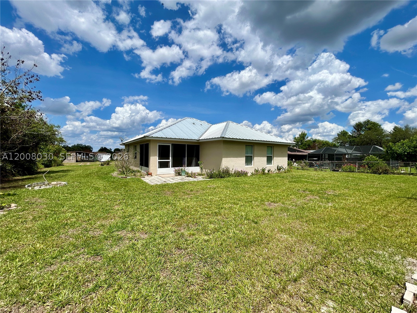 Welcome to this Charming 3-bedroom, 2-bathroom home in Lake Placid, Florida 
Built in 2022, this beautifully maintained property offers modern comfort with stylish finishes throughout.
Enjoy peace of mind with a durable metal roof and impact windows and doors. The interior features granite countertops, wood cabinetry, and a spacious open living area—perfect for both everyday living and entertaining.
Step outside to your cozy lanai, an ideal space to relax, unwind, or host guests while enjoying the Florida lifestyle.
Don’t miss this opportunity to own a piece of paradise in a growing and desirable area!
