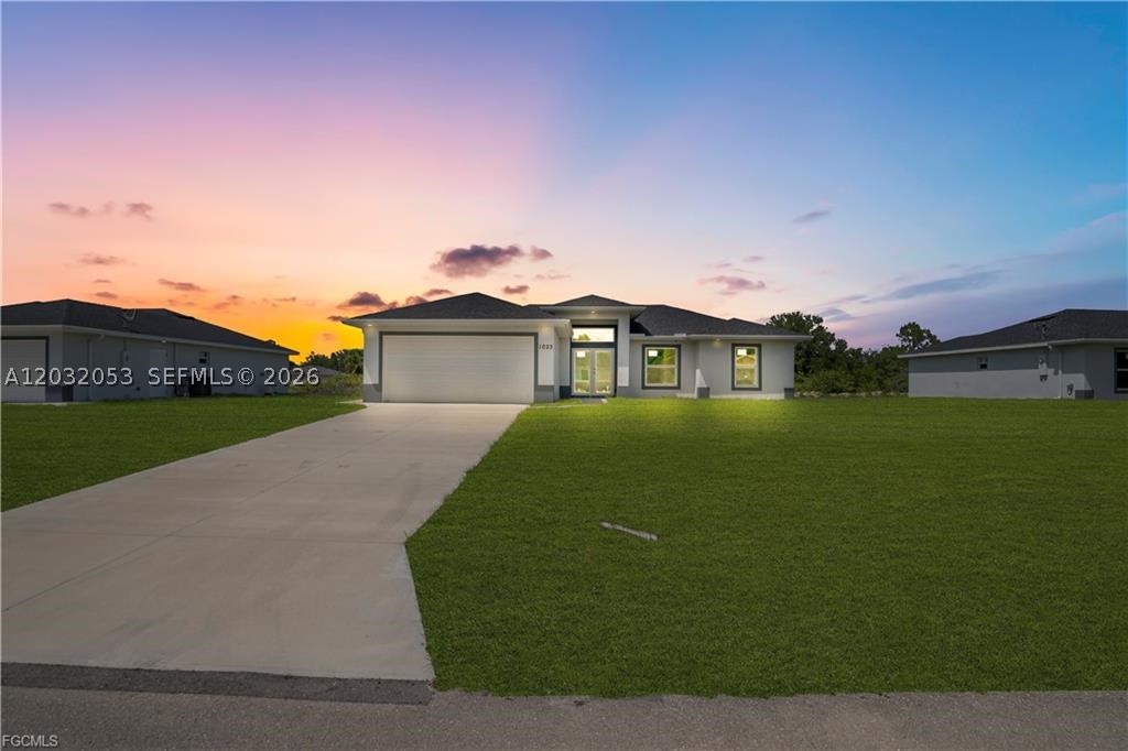 Your Dream Home in Lehigh Acres Awaits!!!!!!!!!! Discover this stunning 1,390 sq. ft. property that perfectly blends comfort, elegance, and functionality—ideal for families seeking a modern and secure lifestyle. Key Features: Impact-resistant windows and doors for peace of mind Porcelain tile flooring. Celling Fans in the Living room and bedrooms. Kitchen and Bathrooms with quartz countertops and stainless-steel appliances Wood cabinets, single vanity in the master bathroom, custom shower and walk-in closet. Coffered ceilings adding style and spaciousness. Extended patio Doble car Garage with extra Side exit door for convenience. A spacious Kitchen-Dining room area ideal for entertaining family and friends' Prime location in Lehigh Acres. This property is more than just a house—it’s a lifestyle waiting for you. Schedule your visit today and experience it firsthand! CALL FOR YOU PRIVATE SHOWING!!!!!!!!!