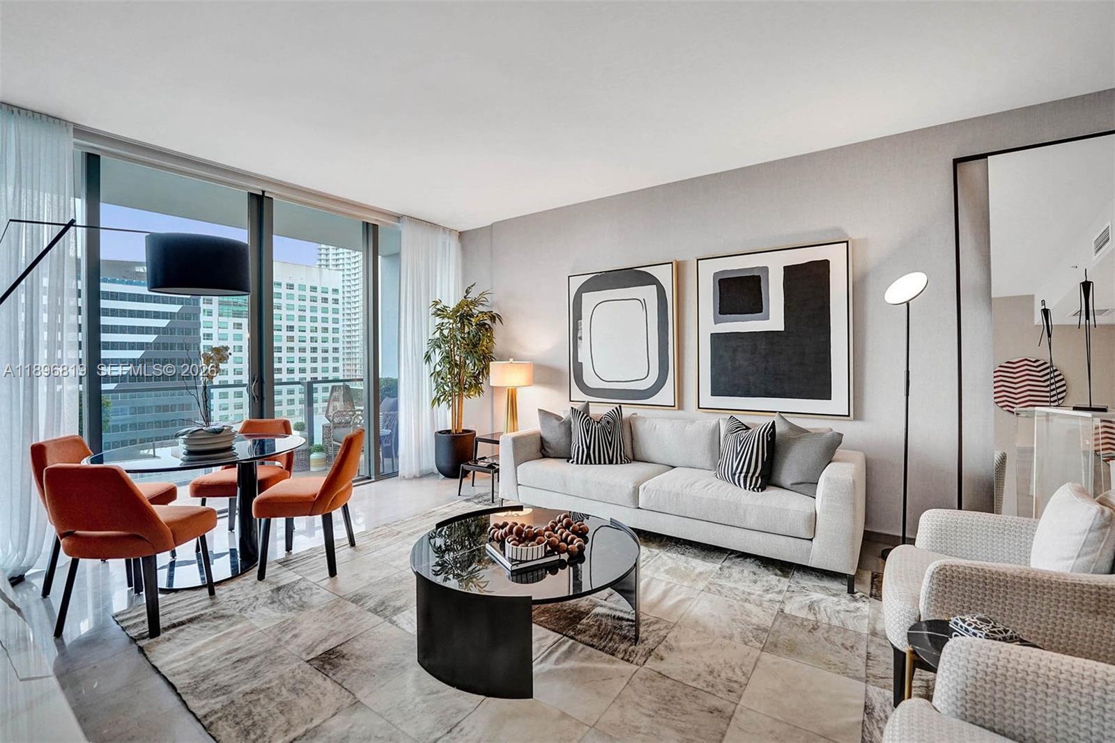 PRICED to SELL. FABULOUS TURN-KEY FURNISHED CONDO Best place to LIVE, WORK and EXPERIENCE the vibrant MIAMI lifestyle. Located in the heart of Brickell right at BRICKELL CITY CENTRE with SPECTACULAR city views. SPACIOUS and BRIGHT one bedroom + 1.5 baths SOLD TURNKEY – DECORATED ENTIRELY BY THE FAMOUS SOUTHAMERICAN INTERIOR DESIGNER MARI COOPER with high ceilings, modern kitchen with Italian cabinets, Quartz countertops, premium Bosch appliances, spa-inspired bathrooms and marble flooring. Price includes all furniture, décor, and full equipment. Amenities include: Concierge service, pool, gym, spa, sauna, BBQ, social room, kids room, café, valet, and direct access to the mall.