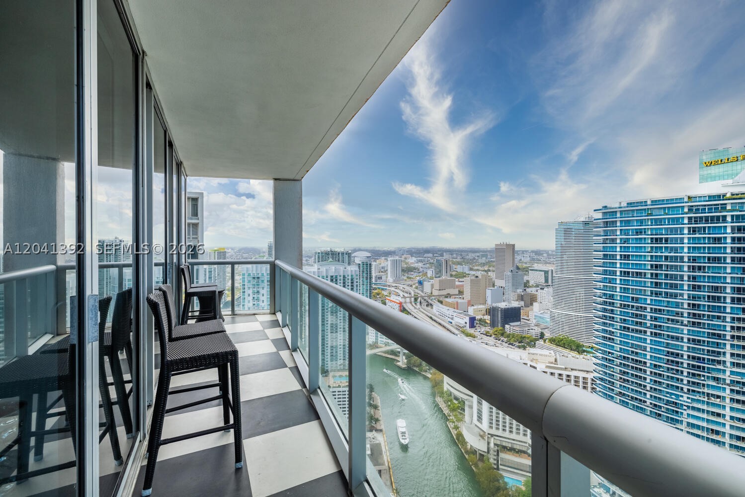 Experience luxury living at Icon Brickell Tower I! Bright corner 2BR/2BA residence on coveted 47th-floor '15 line' with stunning views of Miami River, Biscayne Bay & skyline. 1,314 SF with floor-to-ceiling glass and split-bedroom layout. Building exterior improvements underway. Includes water, cable, internet, fitness classes & 1 assigned parking space. Balcony reopened. Seller motivated, open to offers. Vacant & move-in ready.
