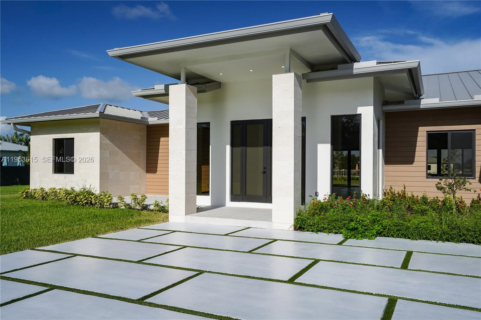 Luxury New Construction Home in Homestead on a Large Lot. Discover this new construction home offering 4000 S.F. of air-conditioned living space on a spacious 1-acre lot. This stunning residence features 5 spacious bedrooms and 6 luxurious bathrooms. The gourmet kitchen is a chef's dream with stainless steel appliances and elegant quartzite countertops. Bathrooms are beautifully appointed with marble countertops. Enjoy outdoor living with a private pool and hot tub. 3 car garage. City water.