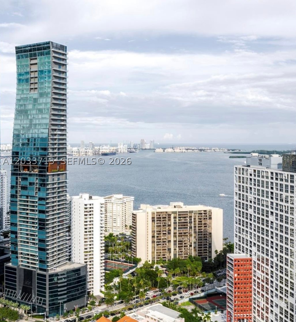 Brickell's finest and exclusive boutique-style luxury tower presents this immaculate and high coveted 01-line corner residence with unobstructed breathtaking open bay and city skyline views. This 2-bedroom, 2.5-bath home (furniture negotiable) features motorized blinds throughout, custom built-in closets, Hi end lighting and finishes through out the residence and premium Wolf/Sub-Zero appliances. Residents enjoy resort-style amenities including a spectacular 35th floor pool deck with sunrise and sunset views, BBQ area, state-of-the-art fitness center, 24-hour concierge, security and valet, all seamlessly managed through the Echo app. THE VIEWS ARE SPECTACULAR!!!