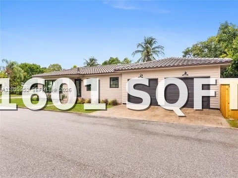 *SQ FOOTAGE IS 1,601* Welcome to this exceptional 3-bedroom, 3-bathroom residence located in the highly sought-after South Palmway neighborhood of Lake Worth Beach, just one block from the Intracoastal Waterway. Situated on a desirable corner lot, this beautifully renovated home offers a rare combination of modern luxury, timeless charm & a two-car garage, a true rarity in this historic coastal community.  Completely renovated with permits, this turnkey property has been redesigned from top to bottom with quality craftsmanship. Major improvements include a brand-new roof, hurricane-impact windows & doors offering insurance savings, electrical panel & wiring, new HVAC & ductwork, updated plumbing, new drywall, & new flooring throughout.  The  chef's kitchen features professional-series appliances, custom cabinetry, elegant quartz countertops & a functional layout designed for both everyday living and entertaining. All three bathrooms have been tastefully updated with designer finishes, including new vanities, modern fixtures, and beautifully appointed showers. Additional upgrades include a new water heater, irrigation system, fencing, and fresh professional landscaping. The oversized corner lot provides ample space to create your dream backyard oasis, with plenty of room for a pool while still maintaining generous yard space for entertaining, gardening, or simply enjoying the South Florida lifestyle. No detail was overlooked! Come enjoy the best of Lake Worth Beach living.