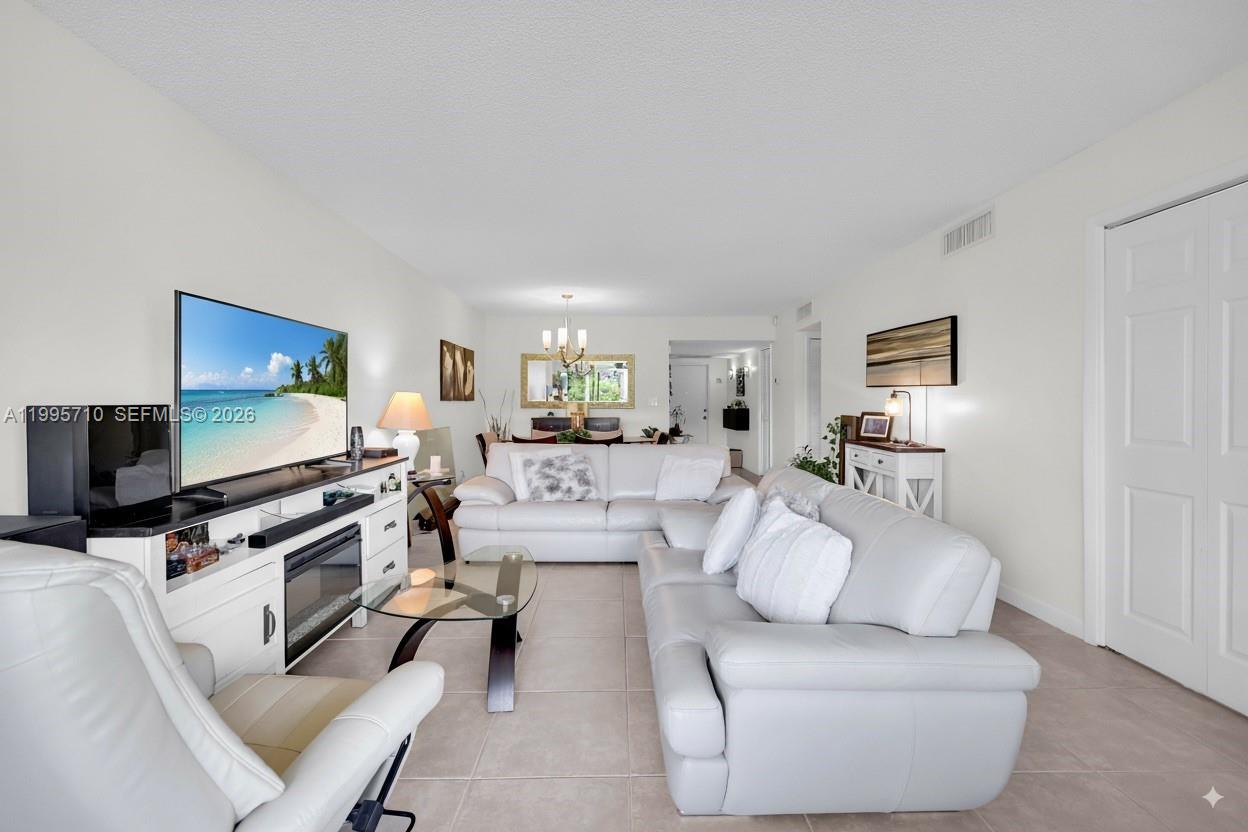 Welcome home to this beautifully remodeled 2-bedroom, 2-bathroom condo in the desirable Palm Aire community! Located on the first floor, this stunning home boasts breathtaking views of the golf course right from your private patio. Perfect for enjoying Florida's beautiful weather and serene surroundings. This unit features updated kitchen features new appliances, quartz countertops, and ample storage. The spacious living area is perfect for entertaining or relaxing. Both bedrooms are generously sized with plenty of closet space, both with their own private bathrooms. Washer and dryer in unit!Palm Aire offers great amenities, including multiple pools, fitness center, walking pathways, and easy access to the golf course. Conveniently located near shopping, dining, top golf, and more.