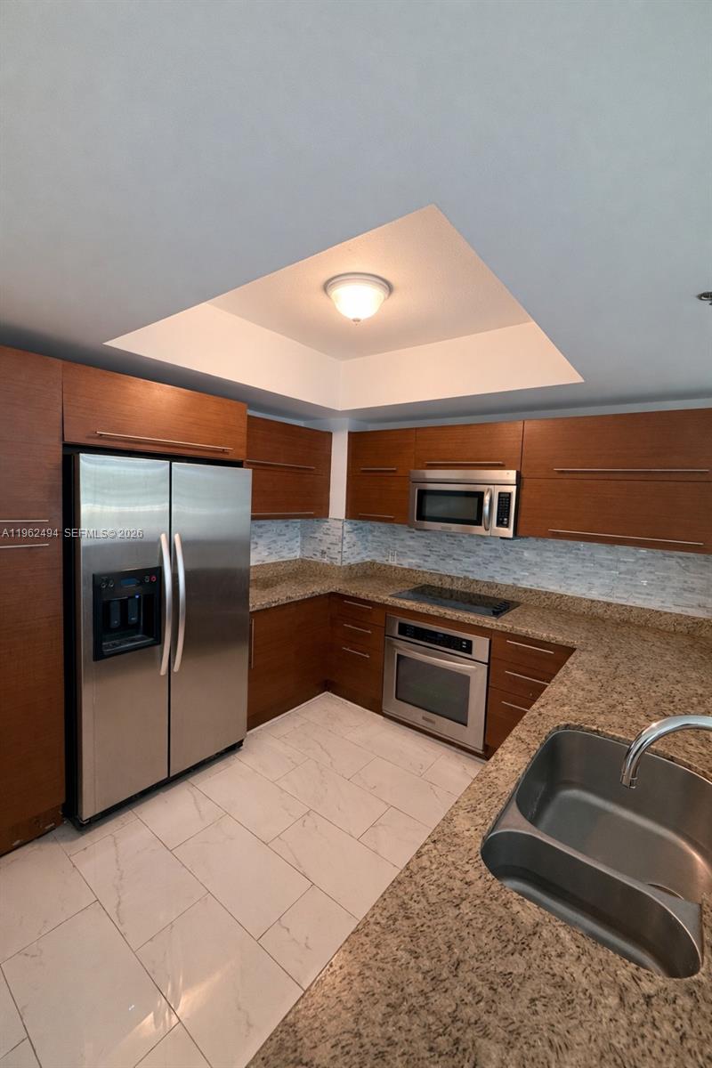 TAO SAWGRASS CONDOMINIUM - Residential