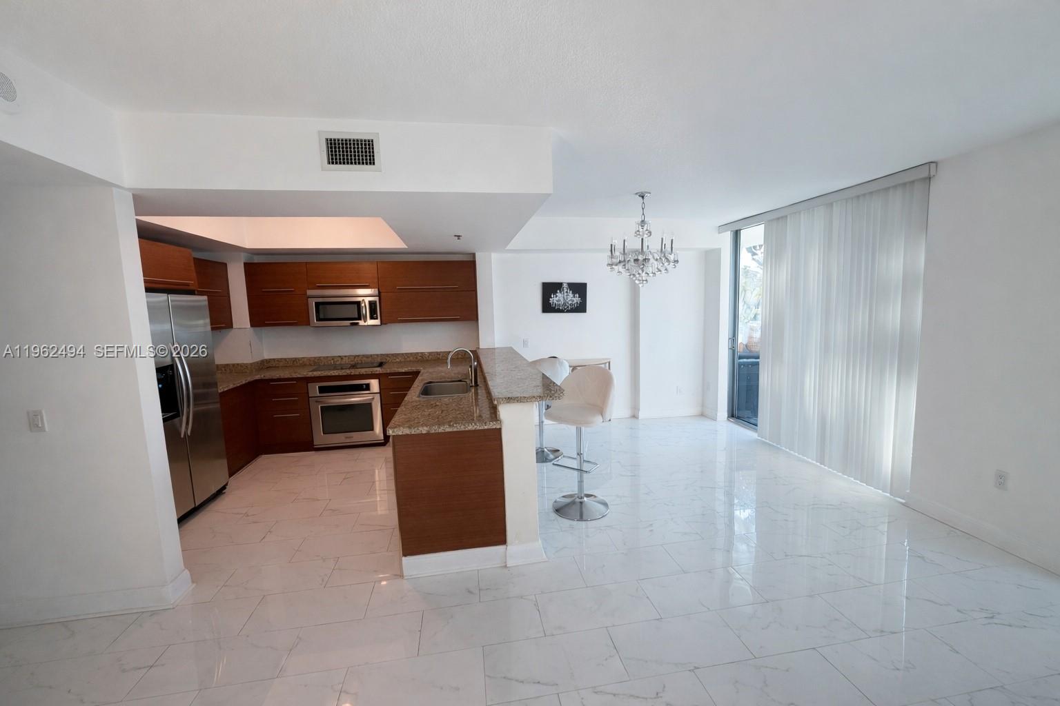 TAO SAWGRASS CONDOMINIUM - Residential